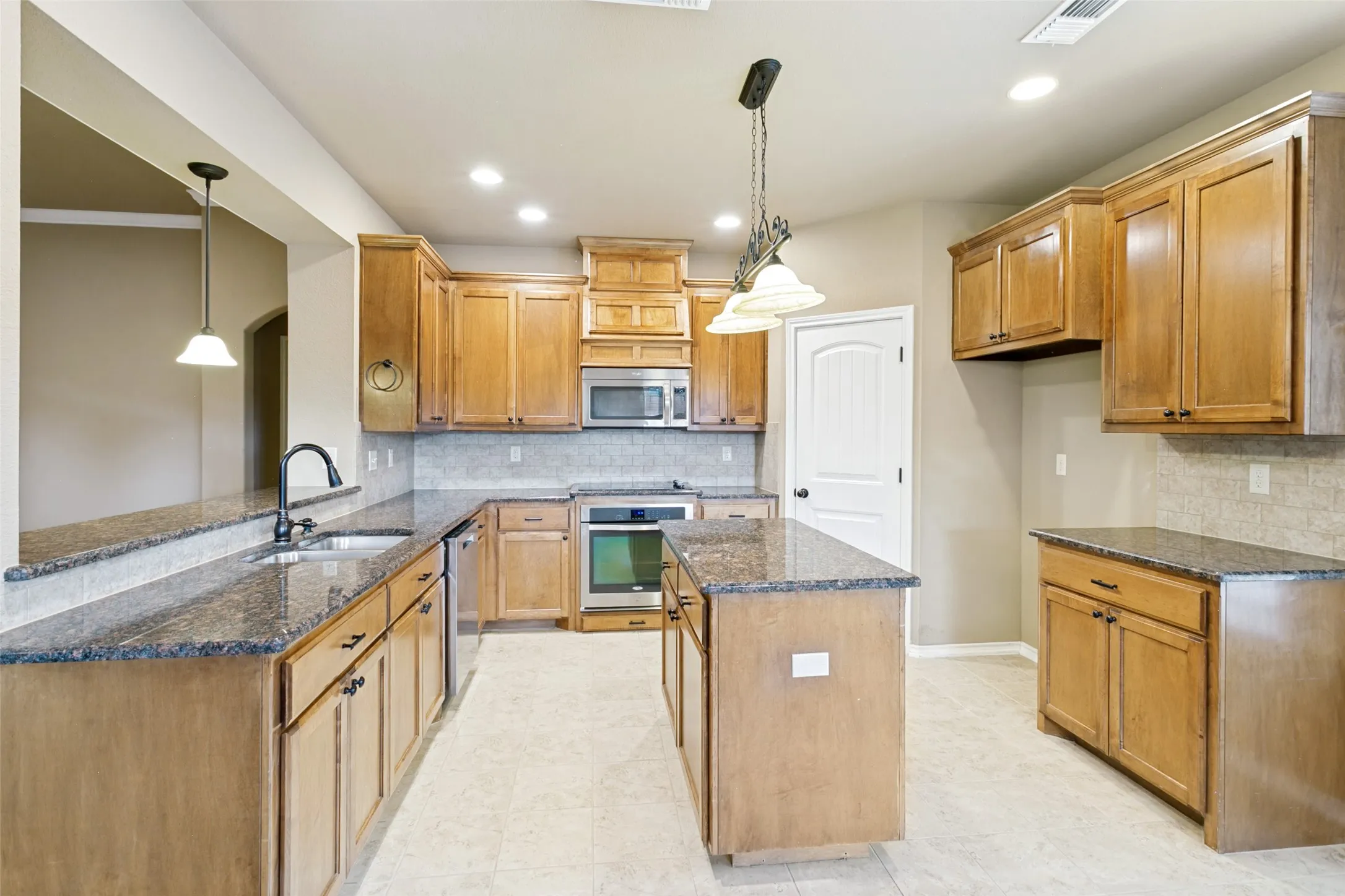 View of the kitchen from the dining room.