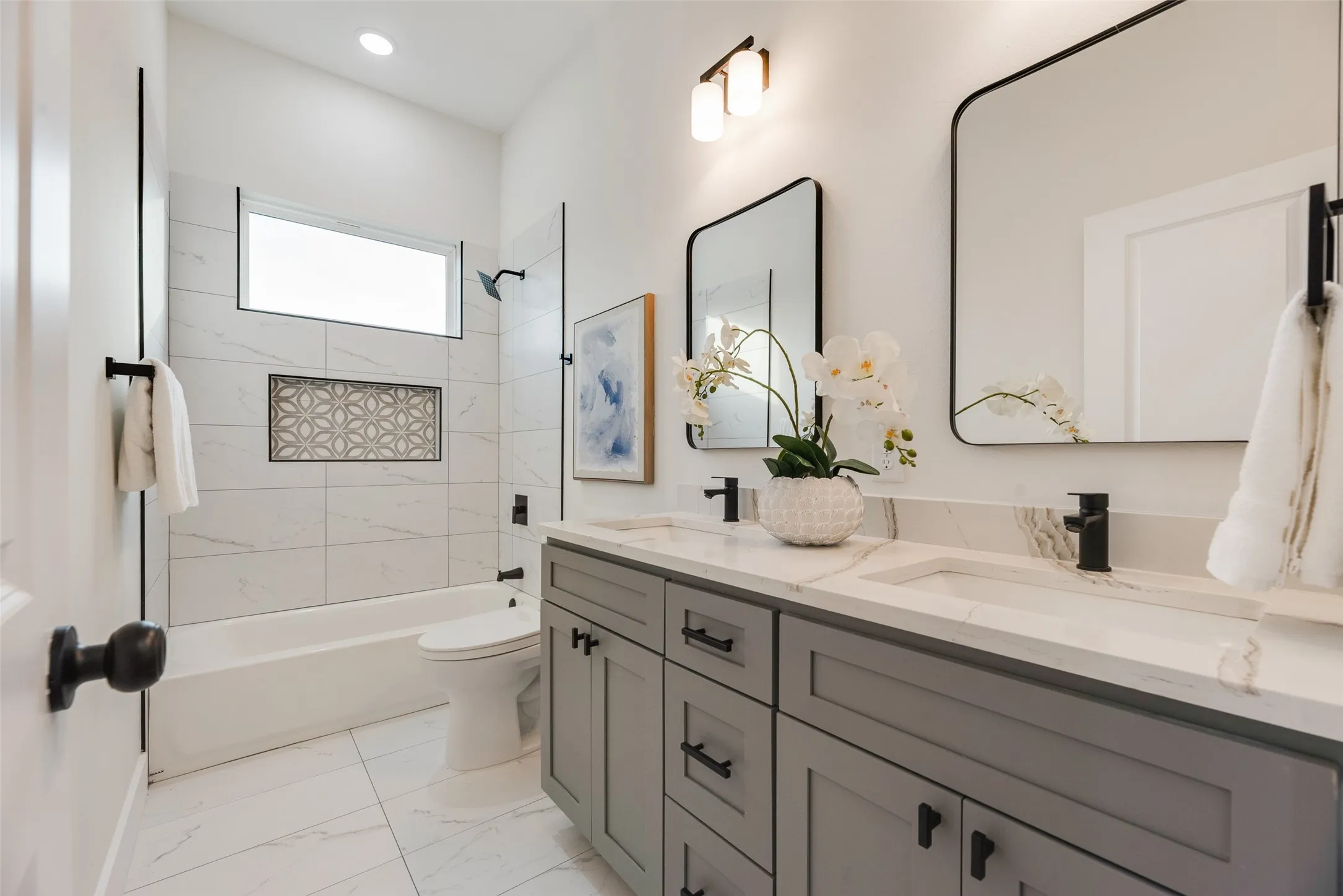 Dual vanity with integrated sinks and quartz countertops