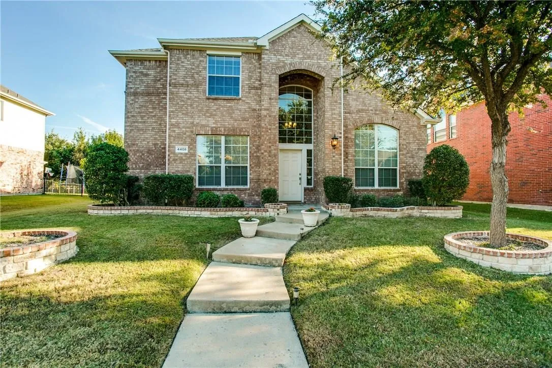 View of front of house with a front lawn