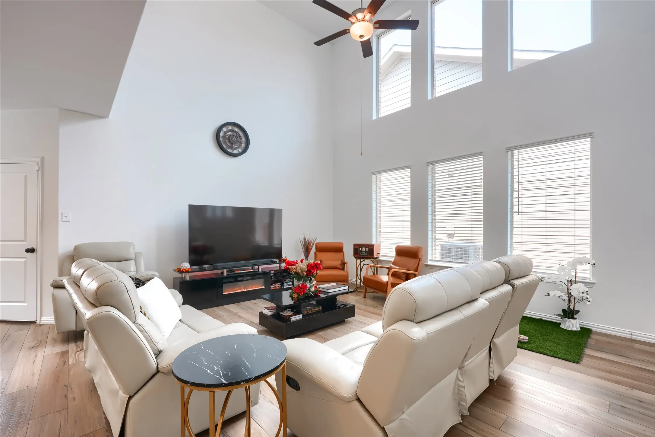 Double-height ceiling with wood-finish flooring
