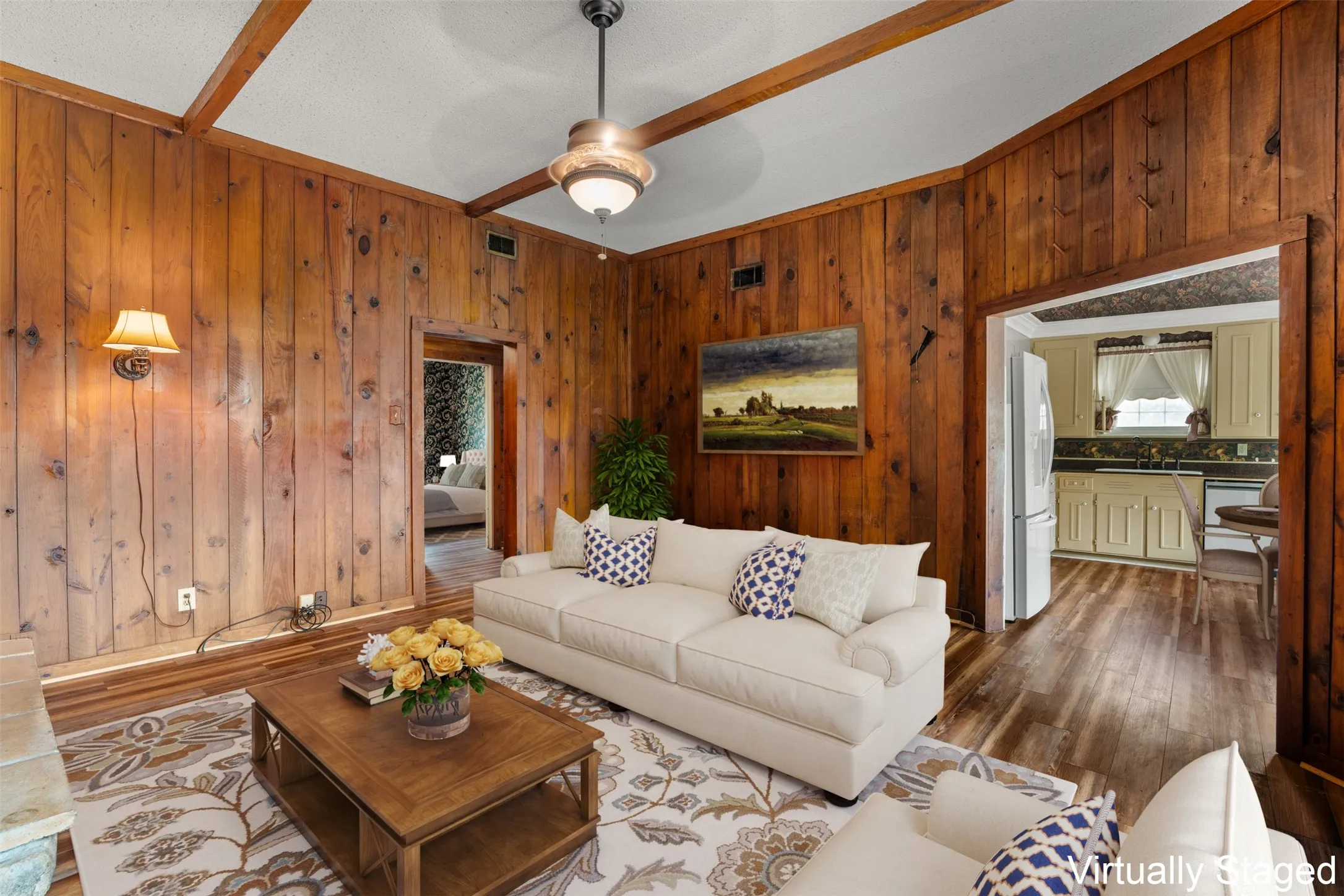 Beautifully wood panel family/den room, open to the kitchen/breakfast area (Virtually staged)