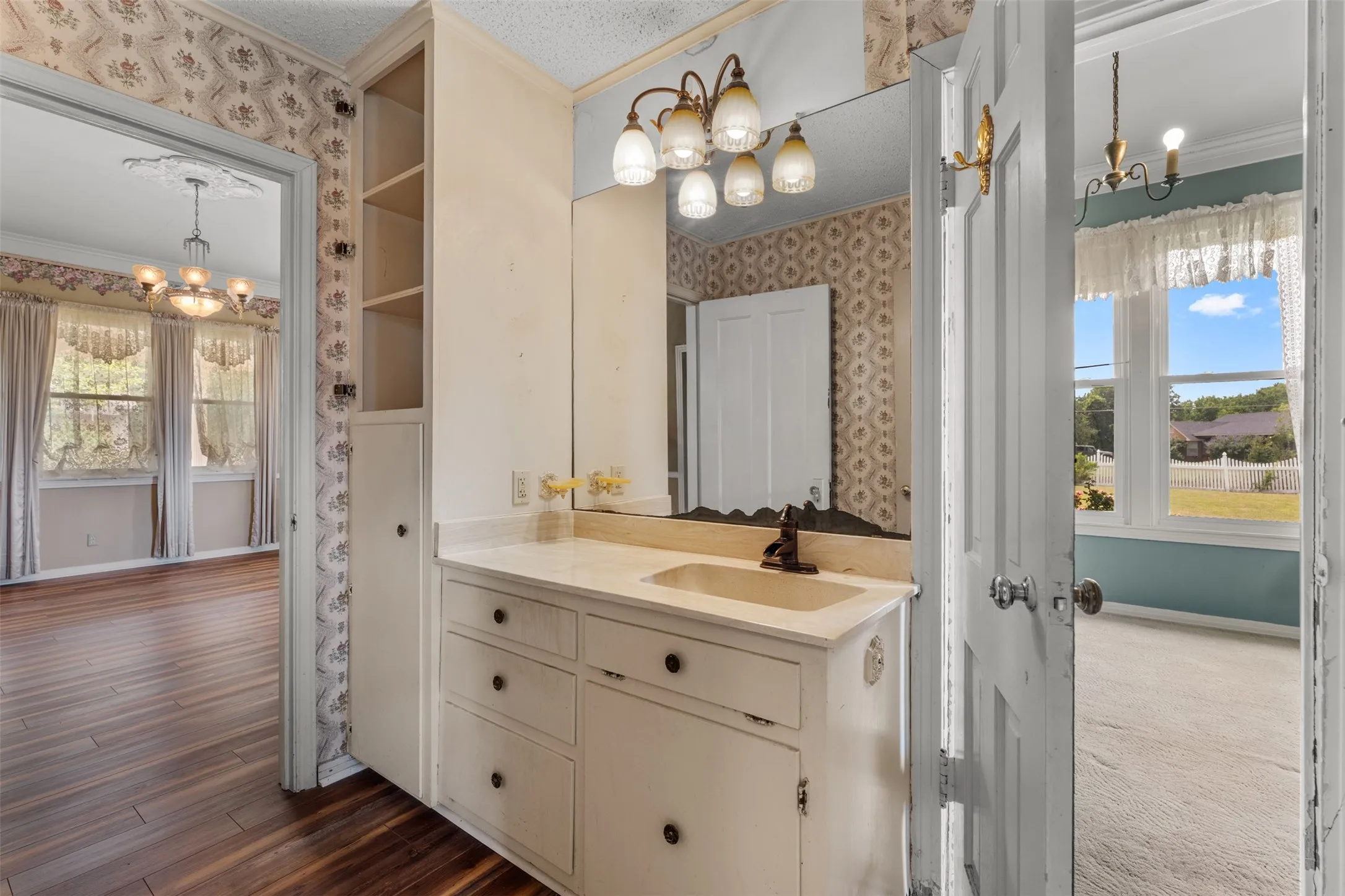 Jack and Jill style 2nd bath with lots of linen storage and cabinets. Accessible from the living room and bedroom #2 & #3