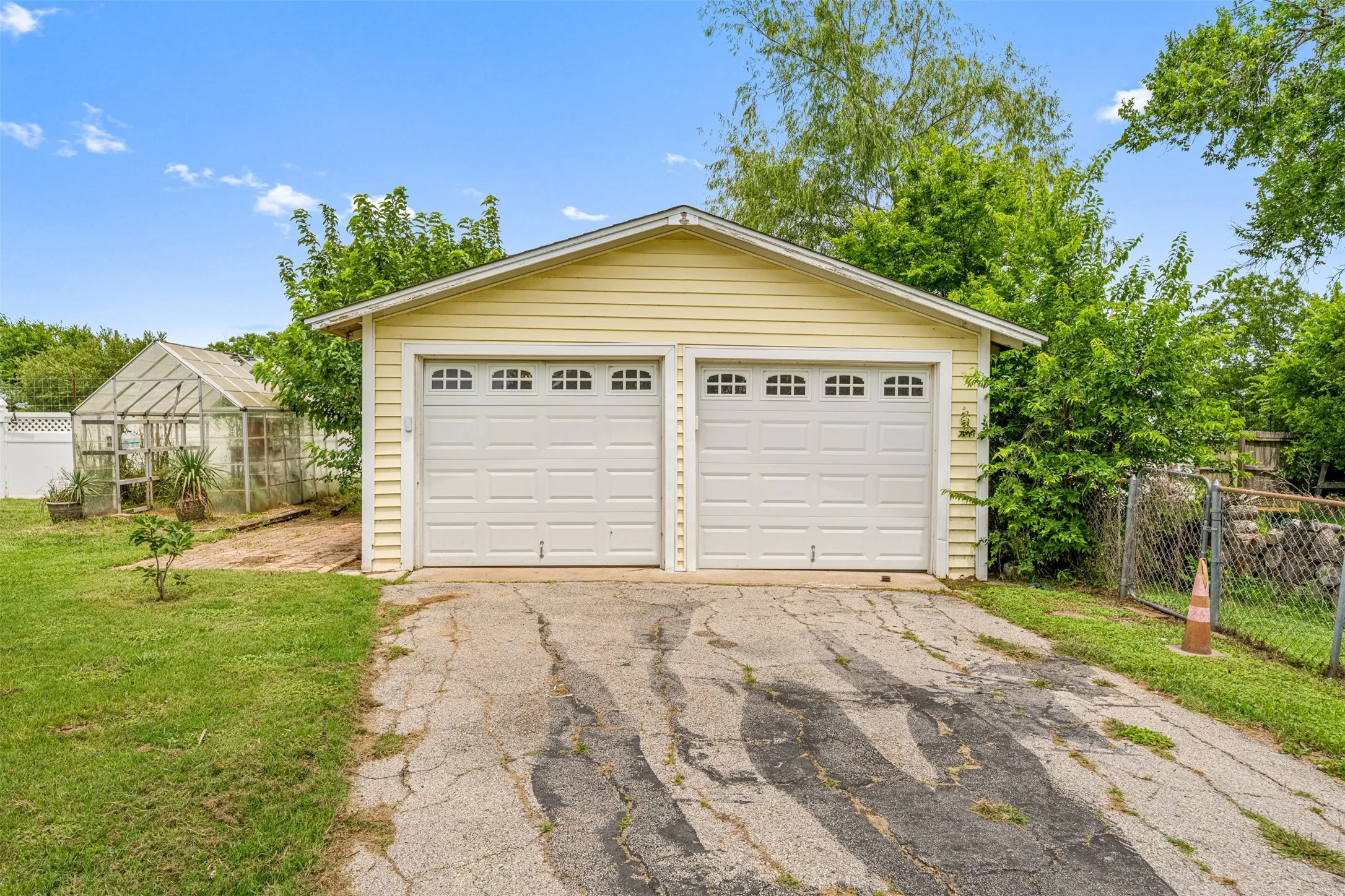 Oversize detached garage, lots of parking for cars, boat or RV