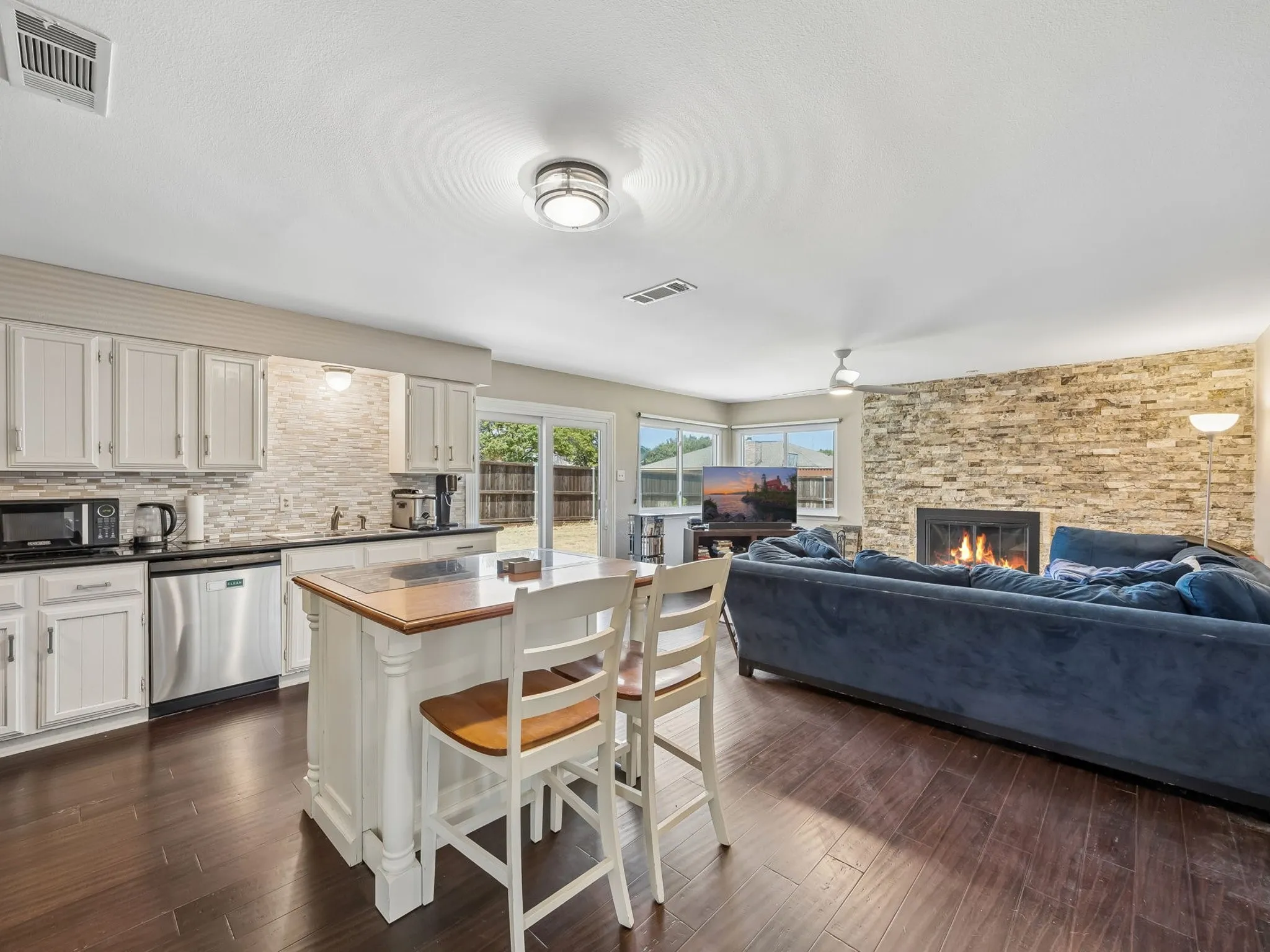 Laminate floors throughout this NO CARPET home