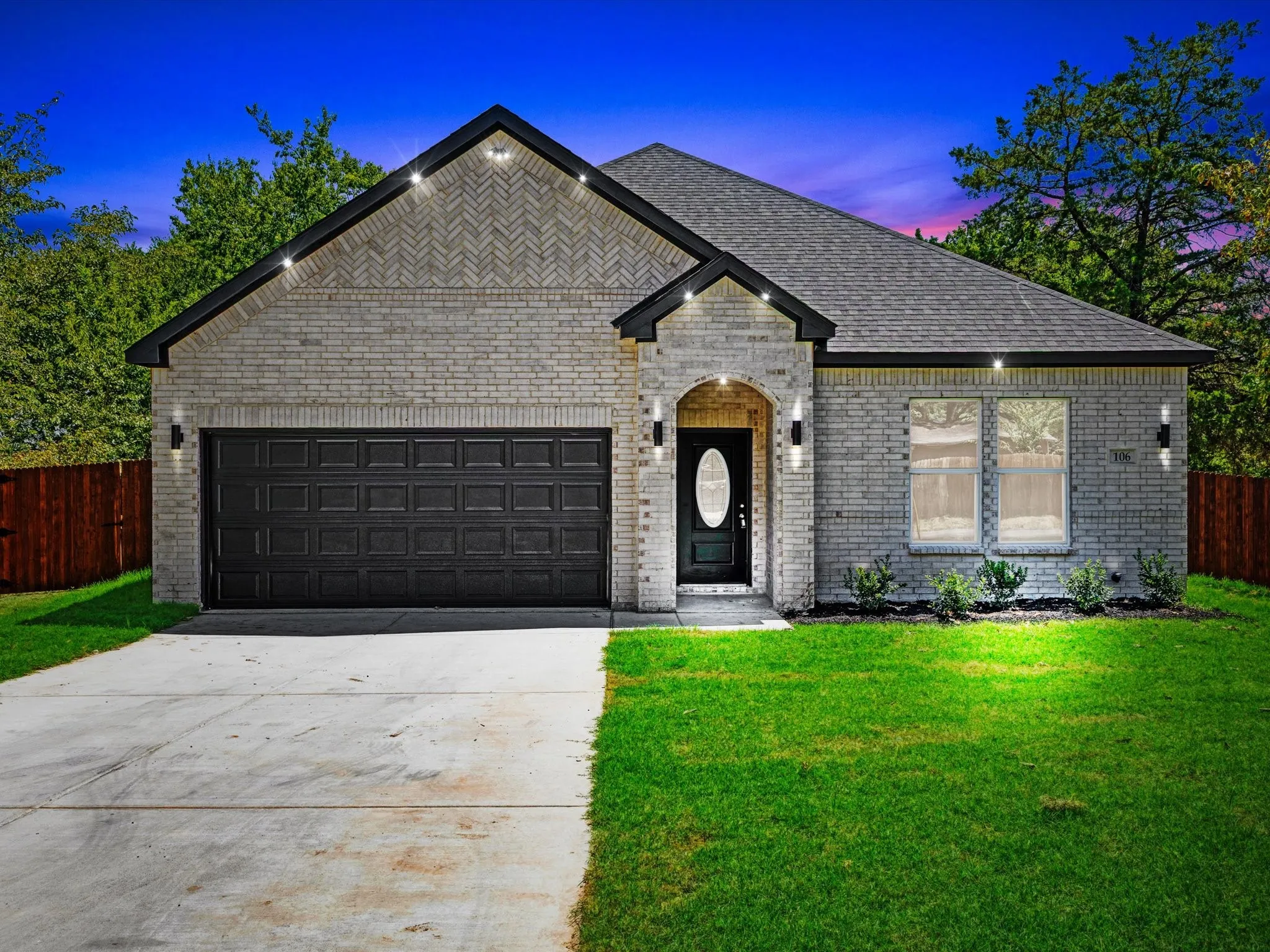 Light brick exterior with contrasting black trim
