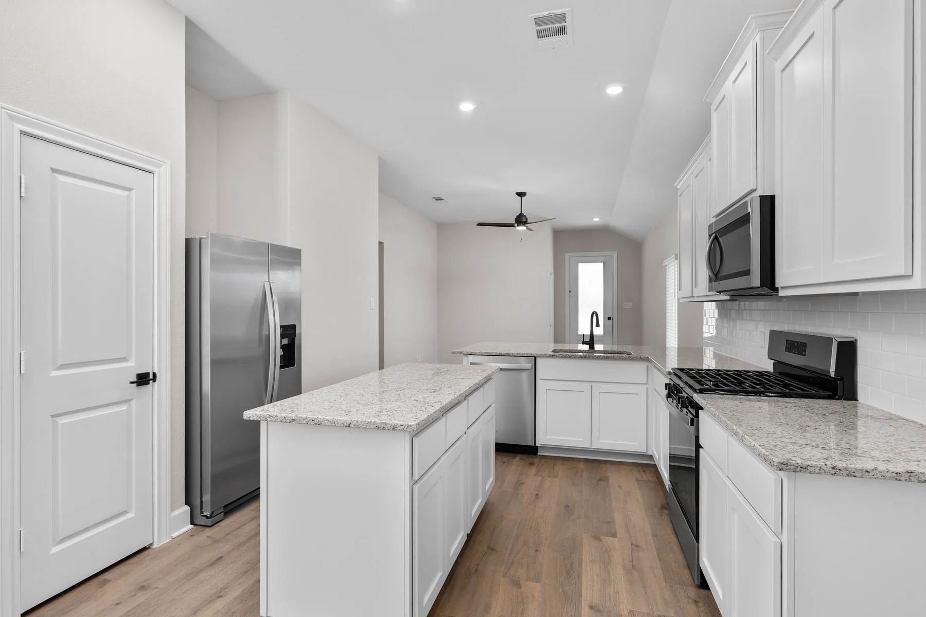 All kitchen Whirlpool® appliances are included.
