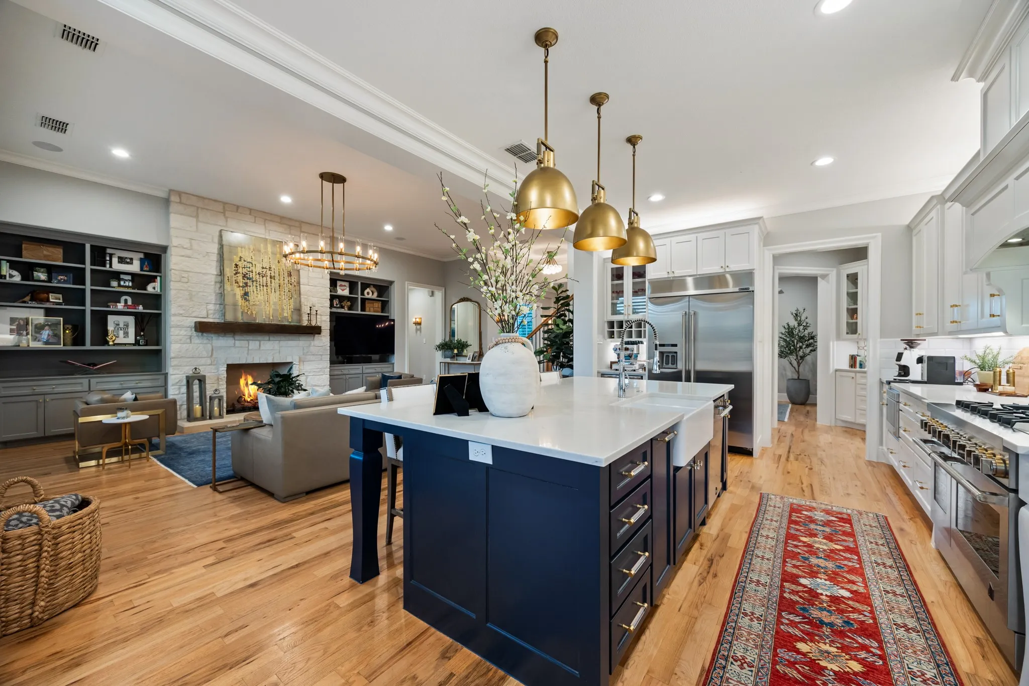 Kitchen opens seamlessly to the living and dining spaces, ideal for entertaining.