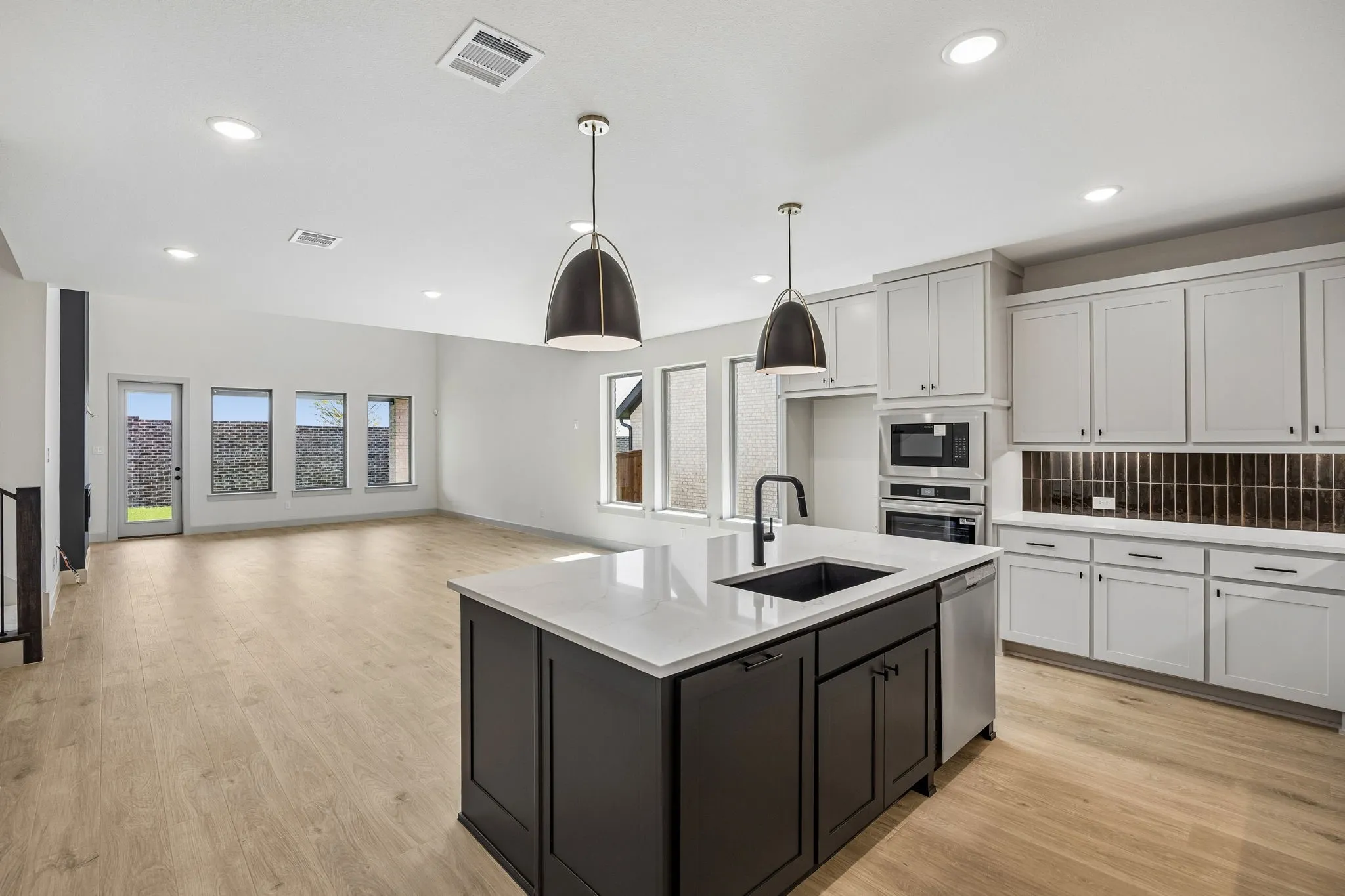 The chef will never be left out of the party in this fantastic open concept home.