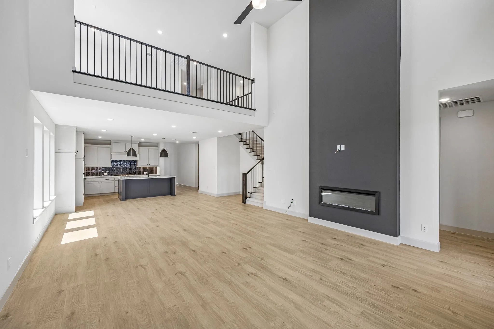 Featuring the game room open to the family room, our Sophie plan offers multi-level entertainment zones!