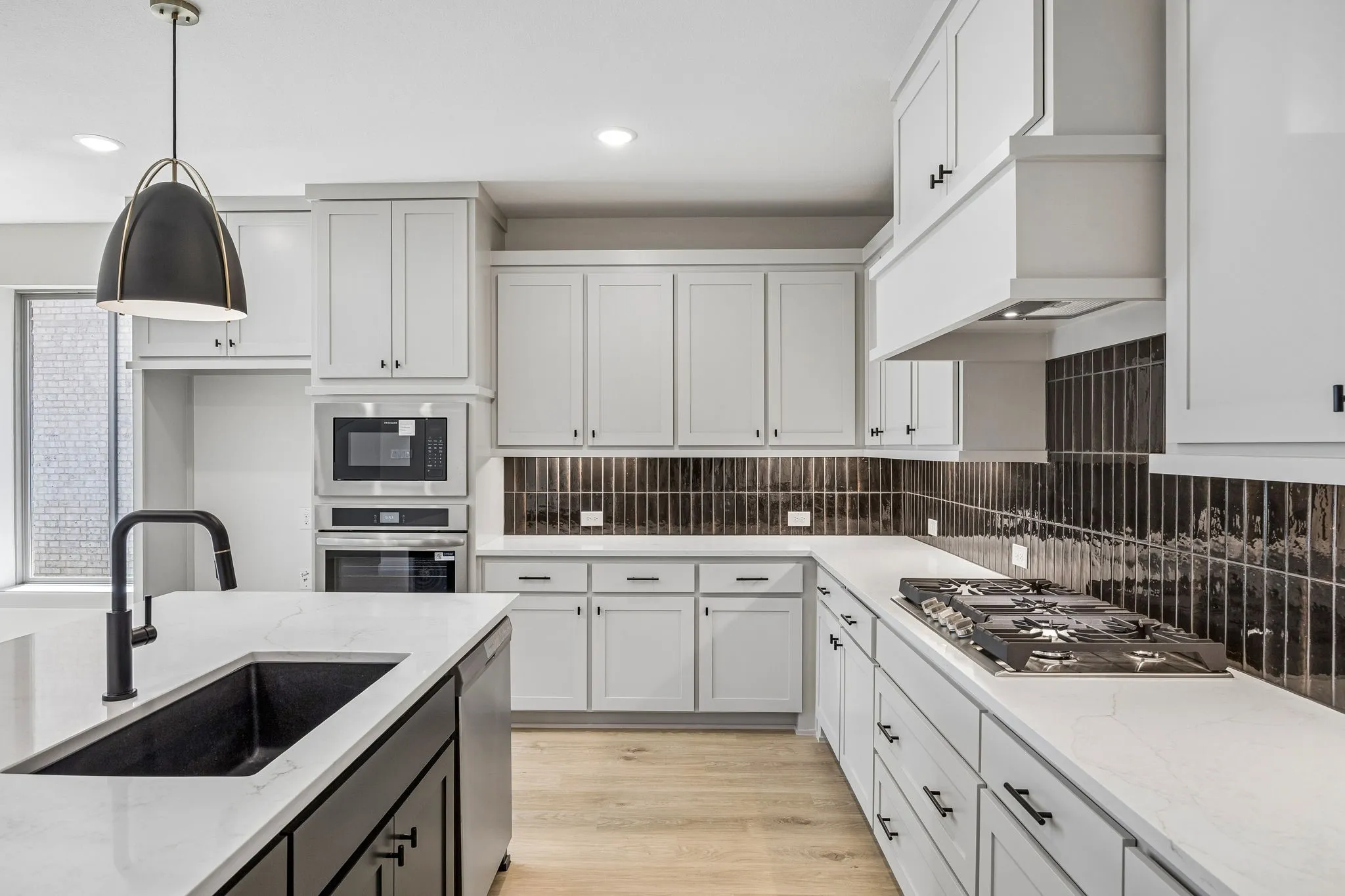Beautiful cabinetry, gorgeous countertops, top of the line stainless steel appliances....this stunning kitchen is everything you have been searching for!