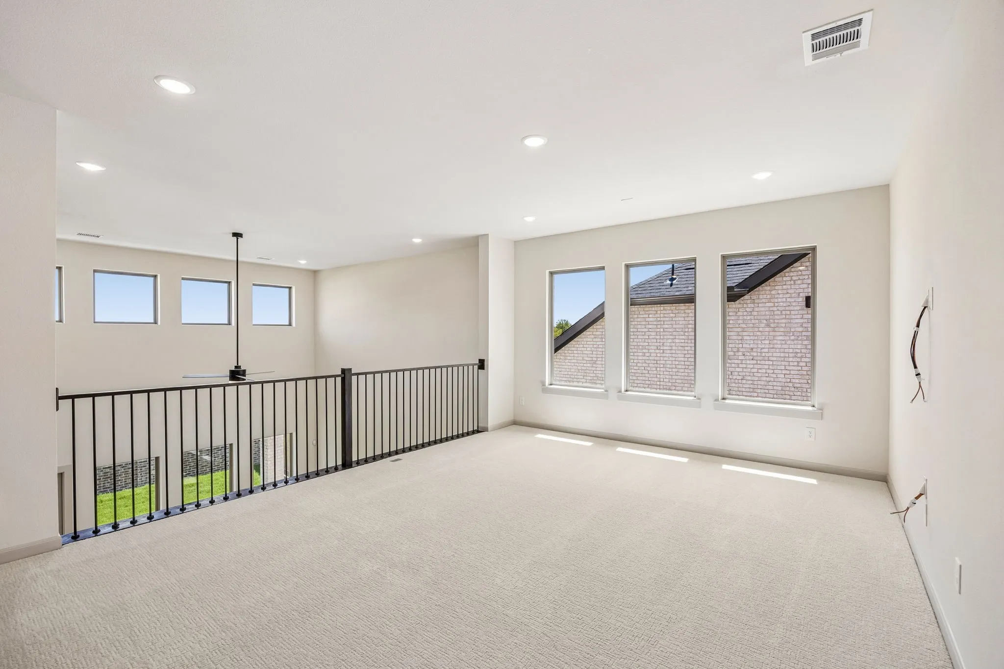 Open, light, bright and airy, the entire family will love entertaining in this over the top game room!