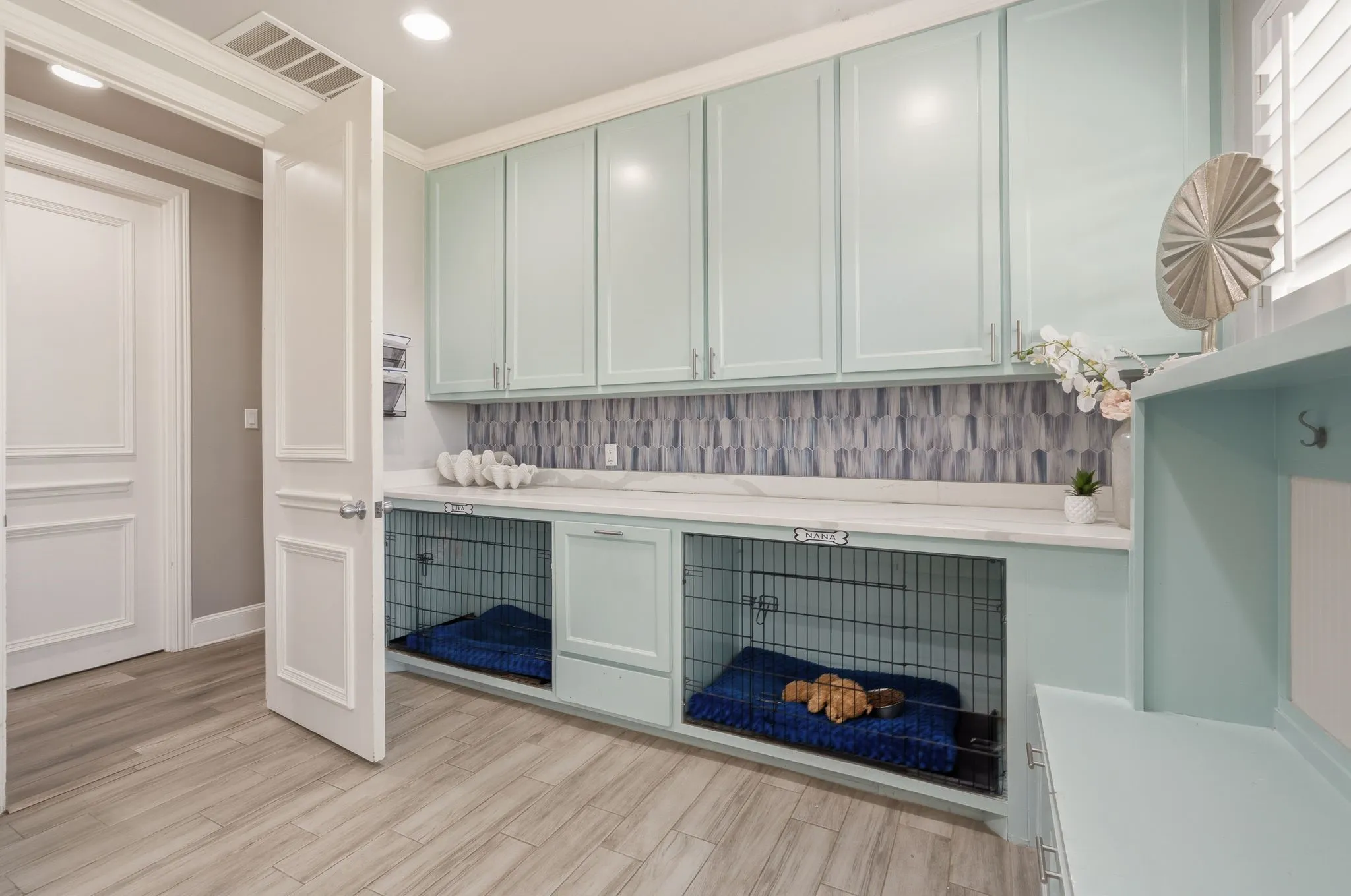 Laundry Room with built-in pet crates!