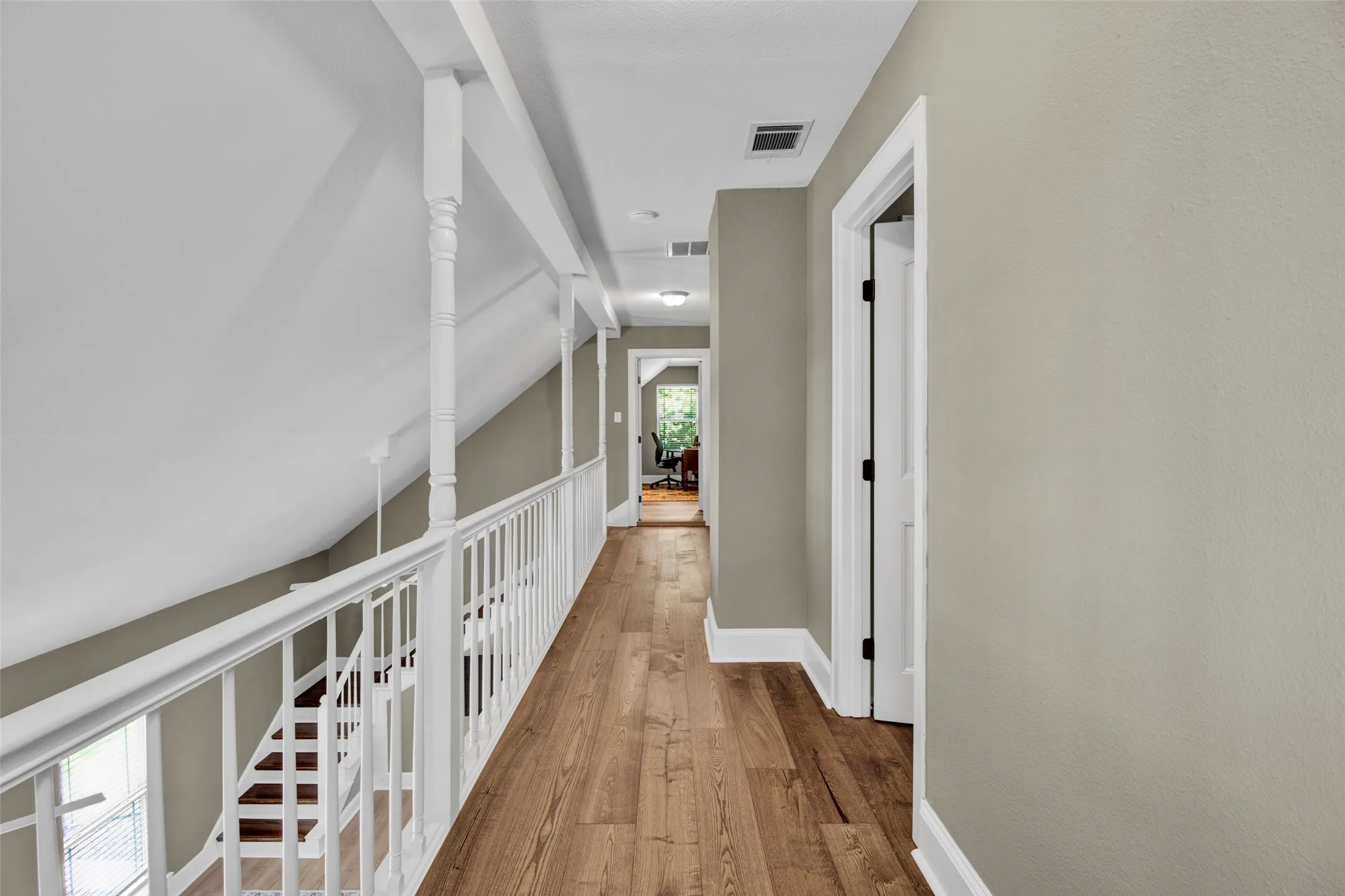 Wood-finish flooring with white trim