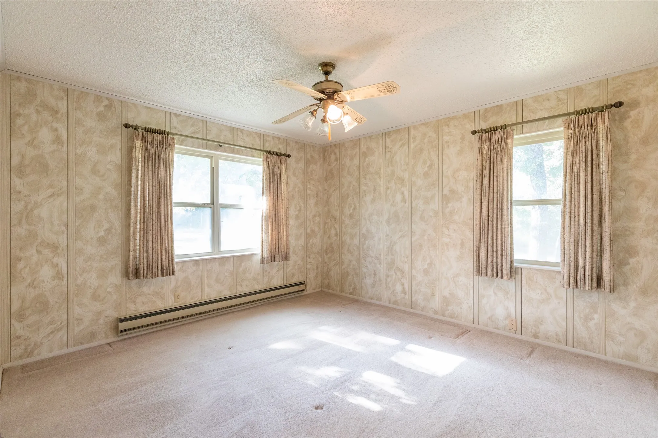 Recessed window with baseboard heating