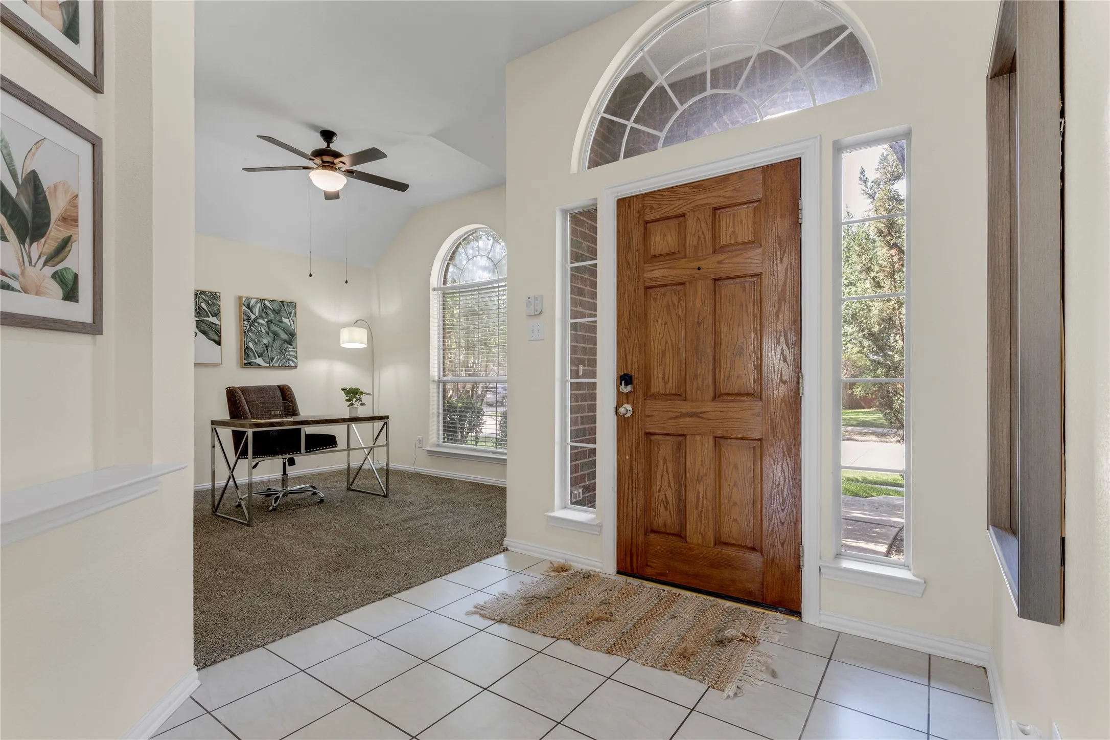 Solid wood front entry door with transom window and sidelights