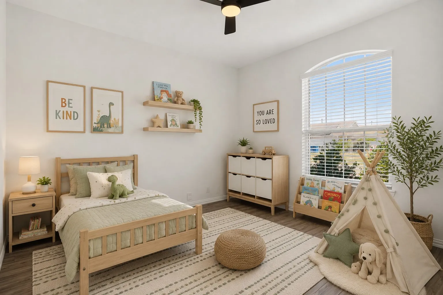 Hardwood-style flooring, white walls, arched window, and a ceiling fan