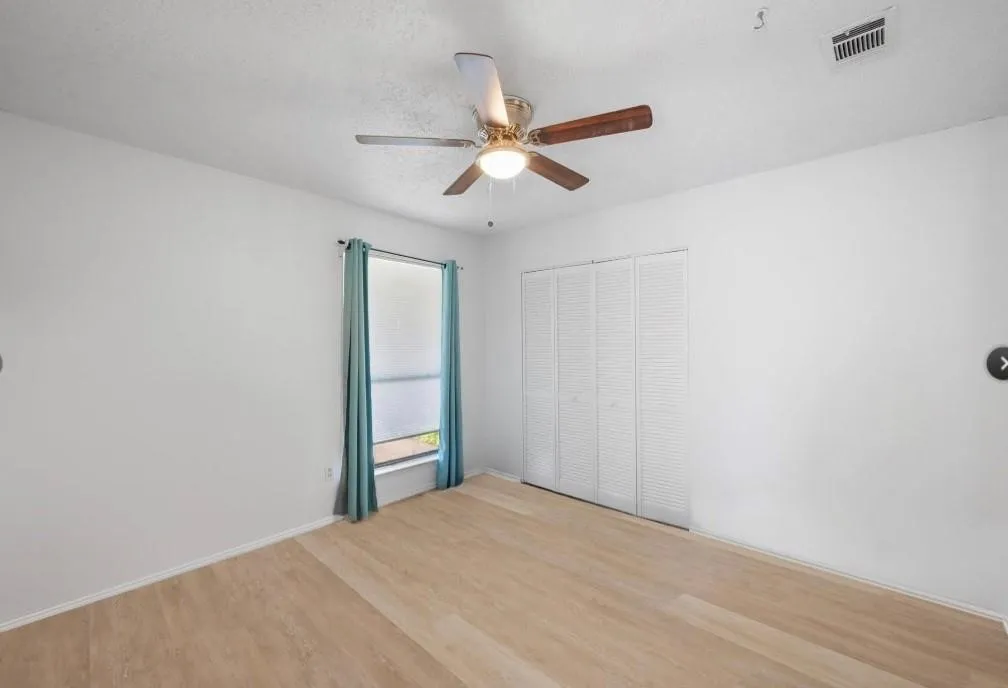 Wood-finish flooring with white walls