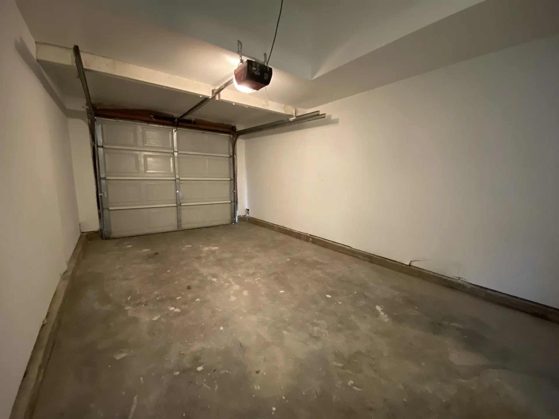 Enclosed garage with garage opener