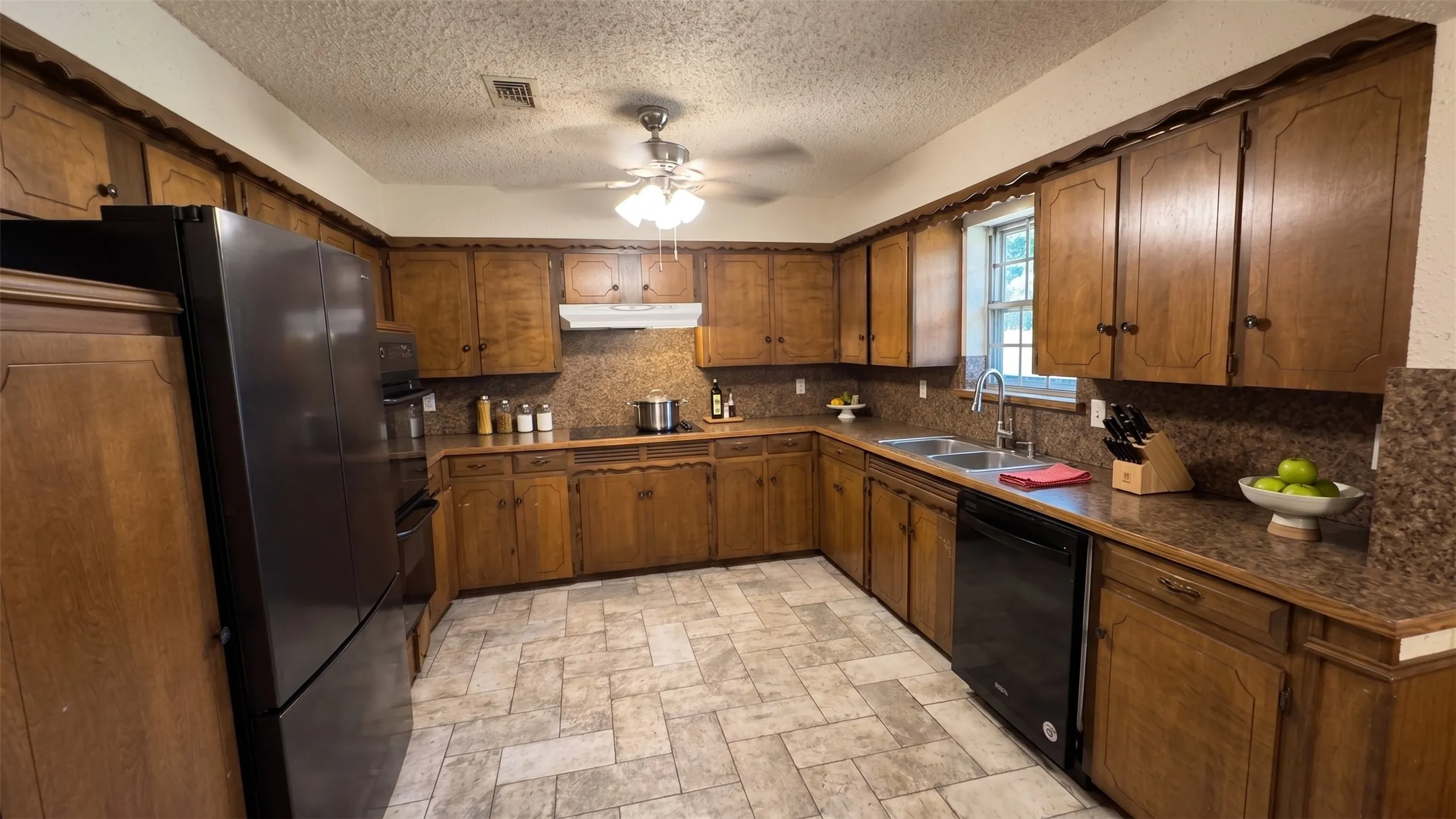 Kitchen has loads of cabinets spece