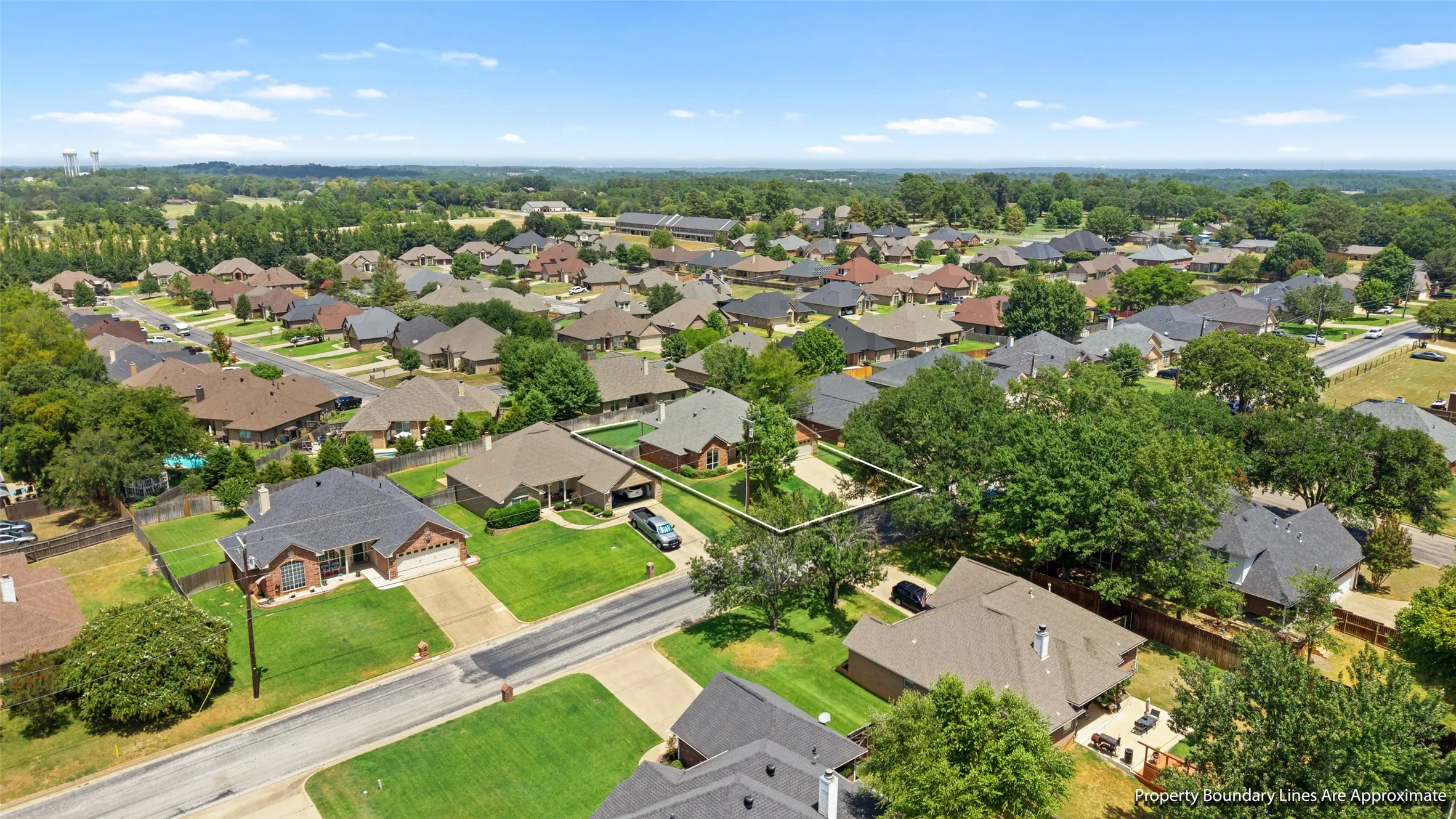 Aerial perspective of a residential neighborhood with a variety of home styles
