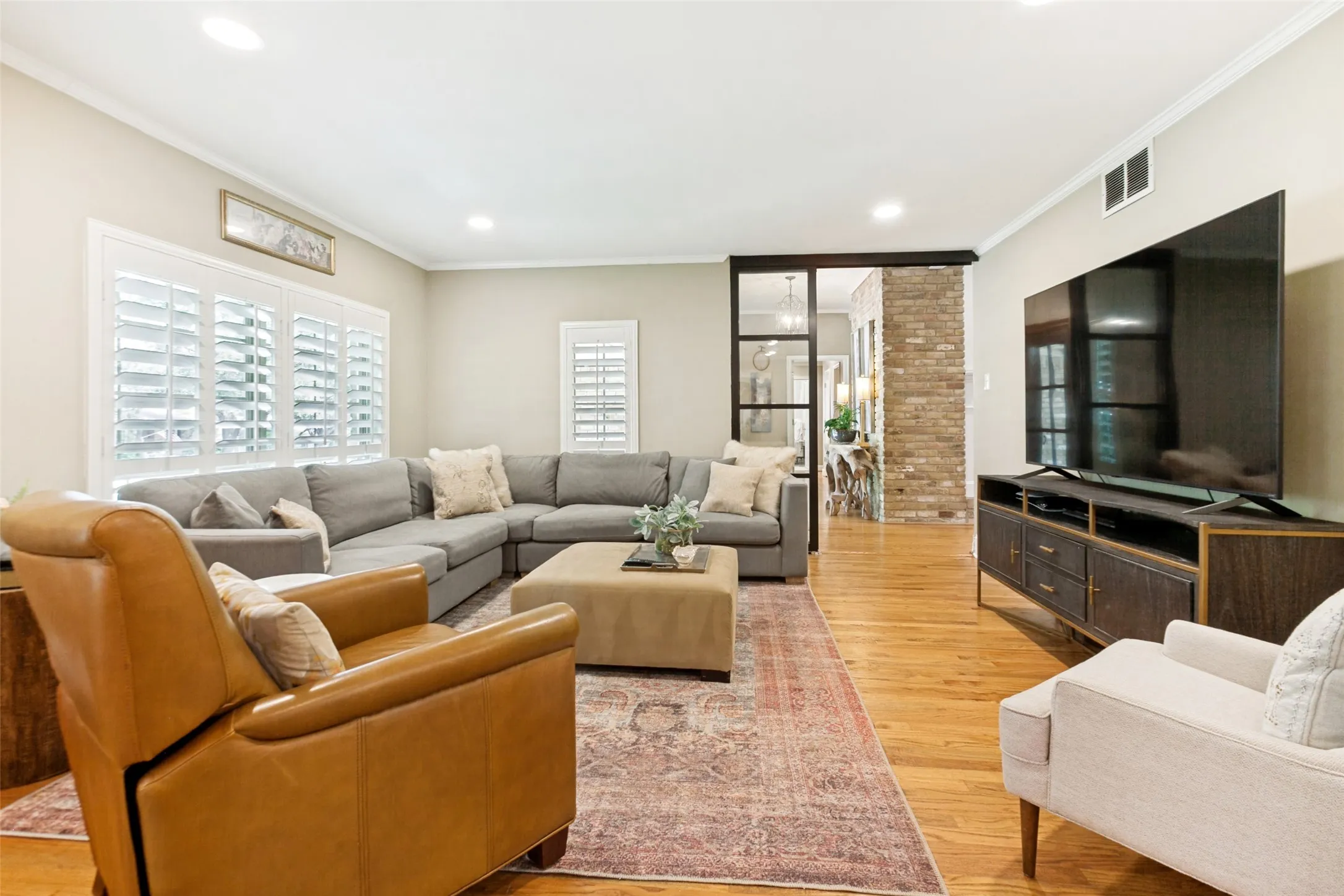 Spacious living off the entry and open to dining room and kitchen