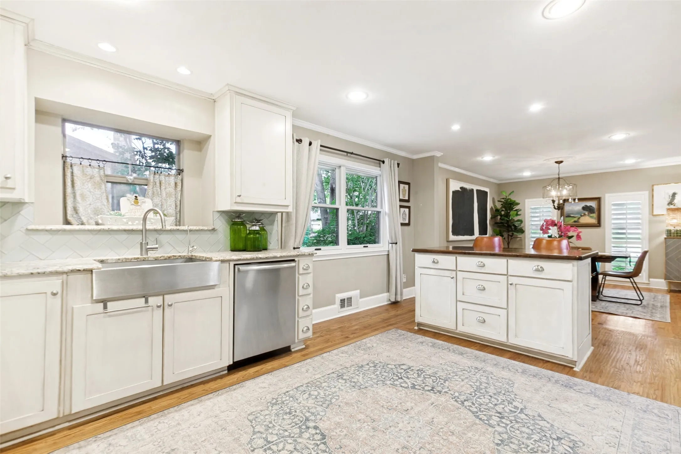 large windows and wood floors