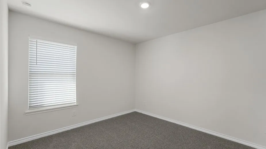 Recessed lighting, window with blinds, and neutral wall color