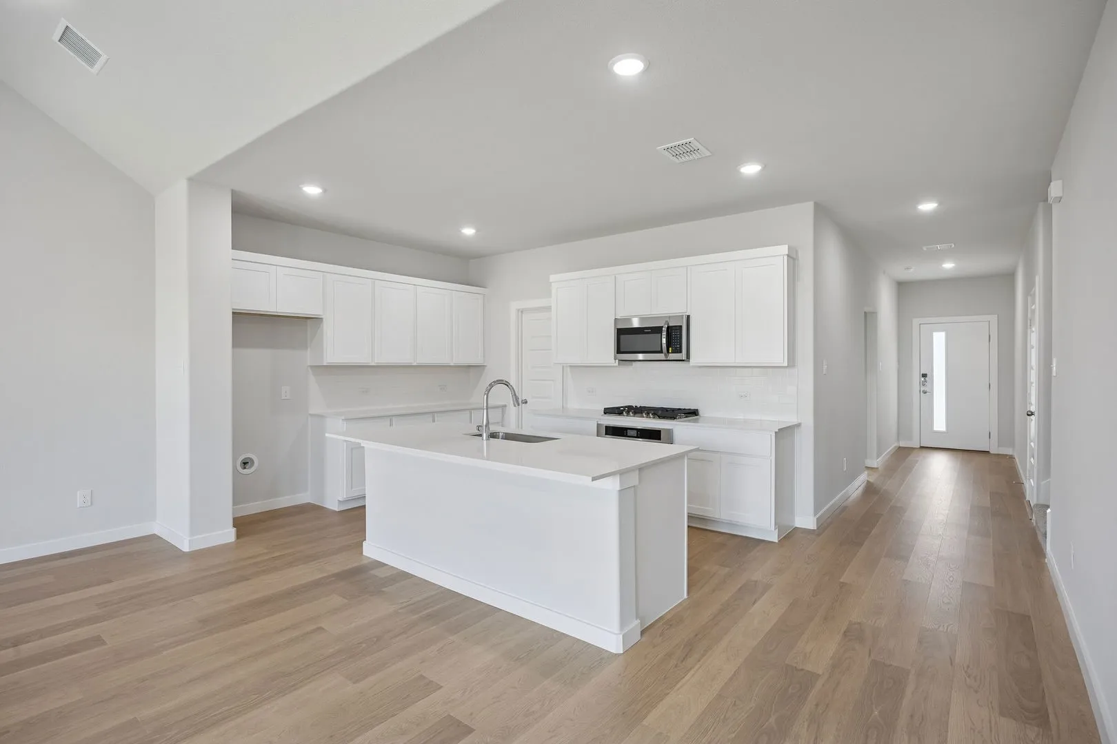 Kitchen in the Masters home plan by Trophy Signature Homes – REPRESENTATIVE PHOTO