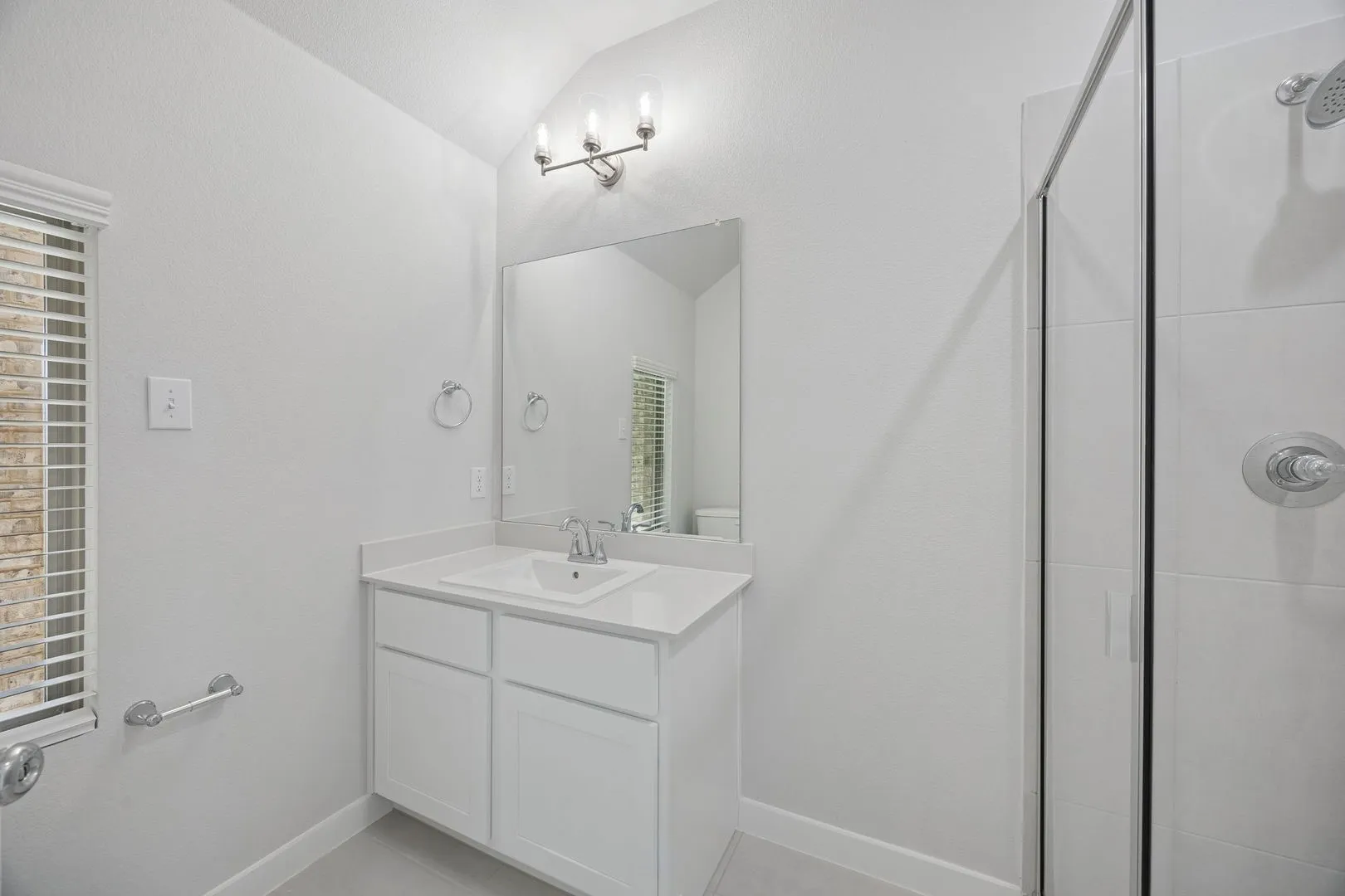 Bathroom in the Masters home plan by Trophy Signature Homes – REPRESENTATIVE PHOTO