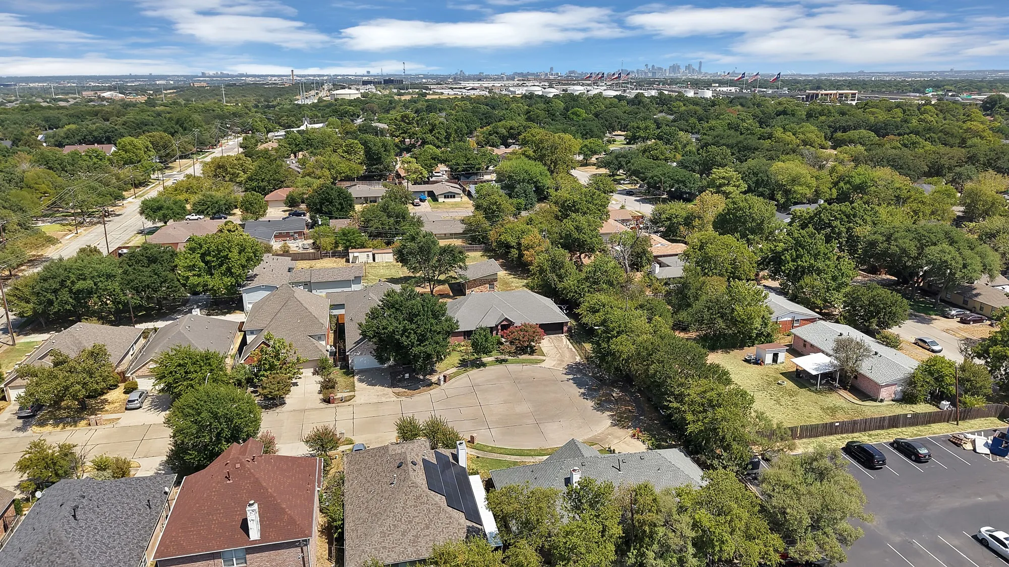 Residential neighborhood with mature trees and established homes