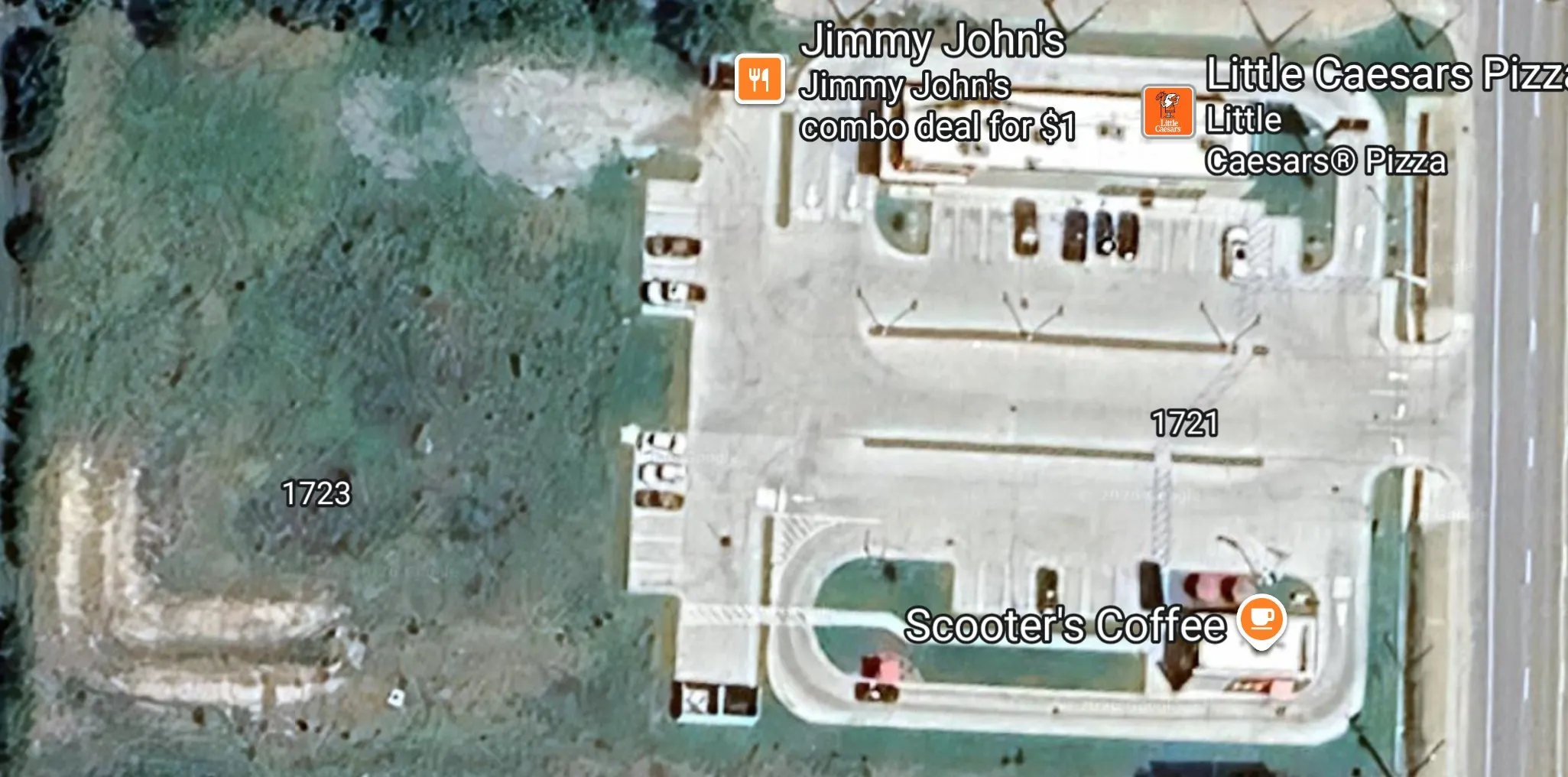 Aerial View. Displaying commercial properties at 1721/1727 and an undeveloped parcel at 1723