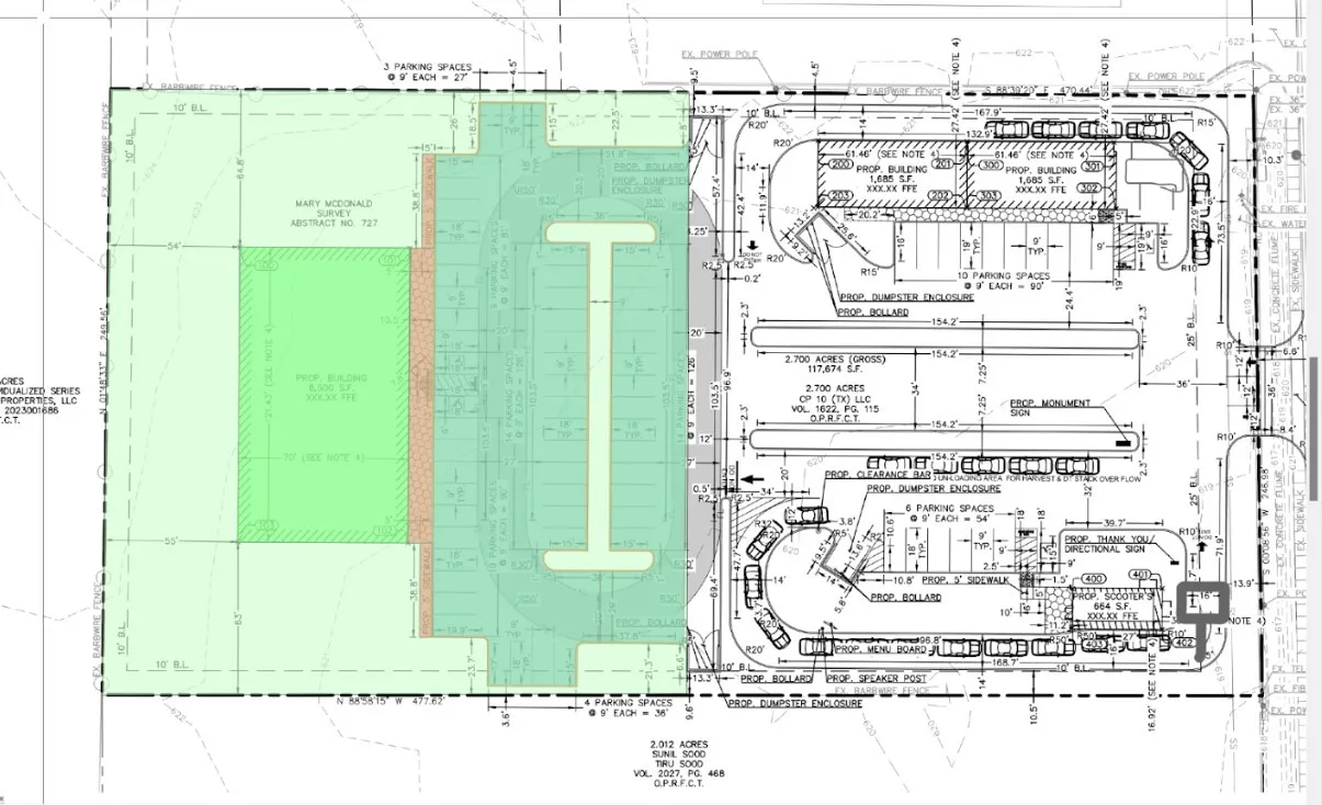 Site map with current and proposed buildings.