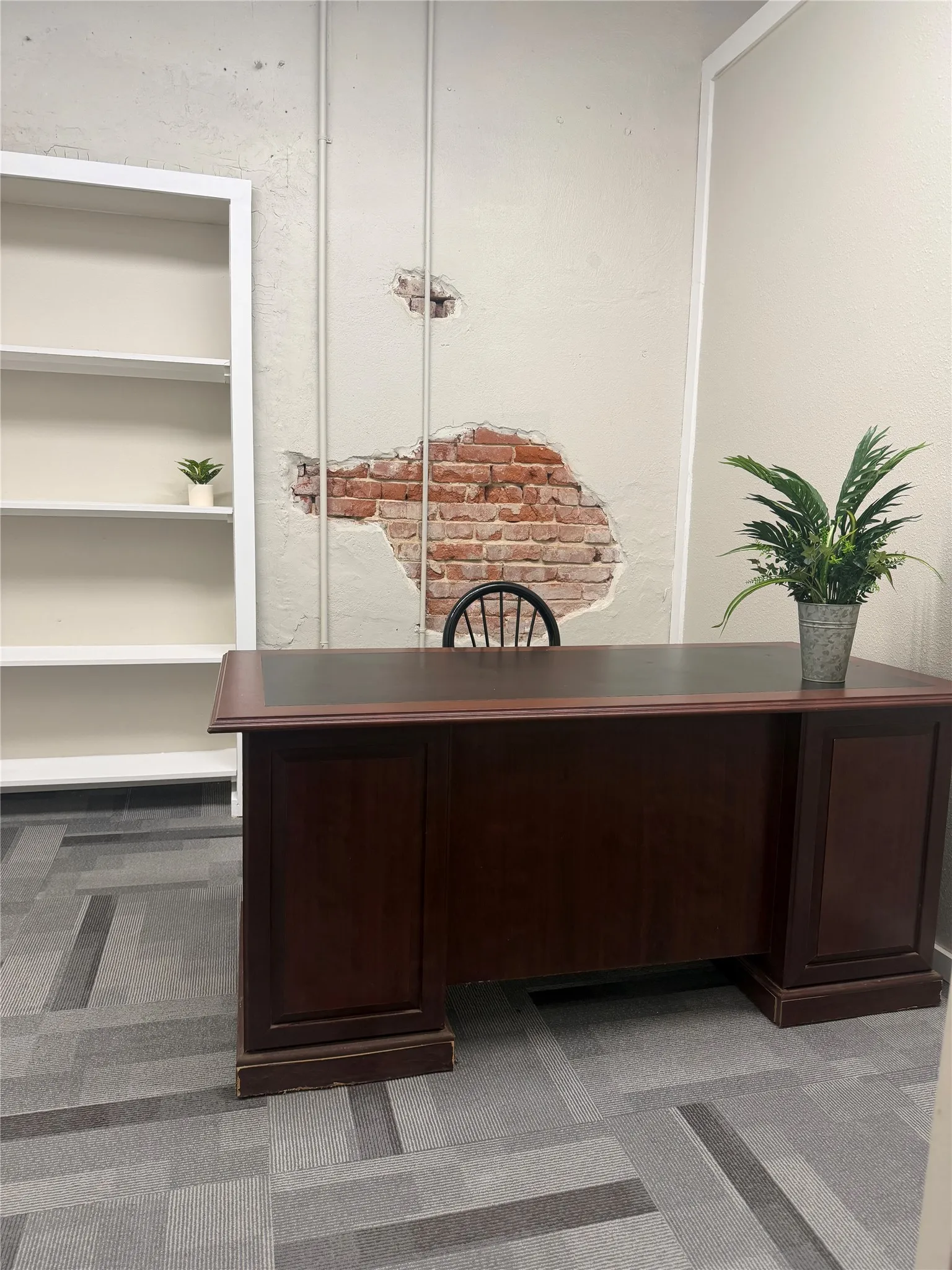Exposed brick wall feature