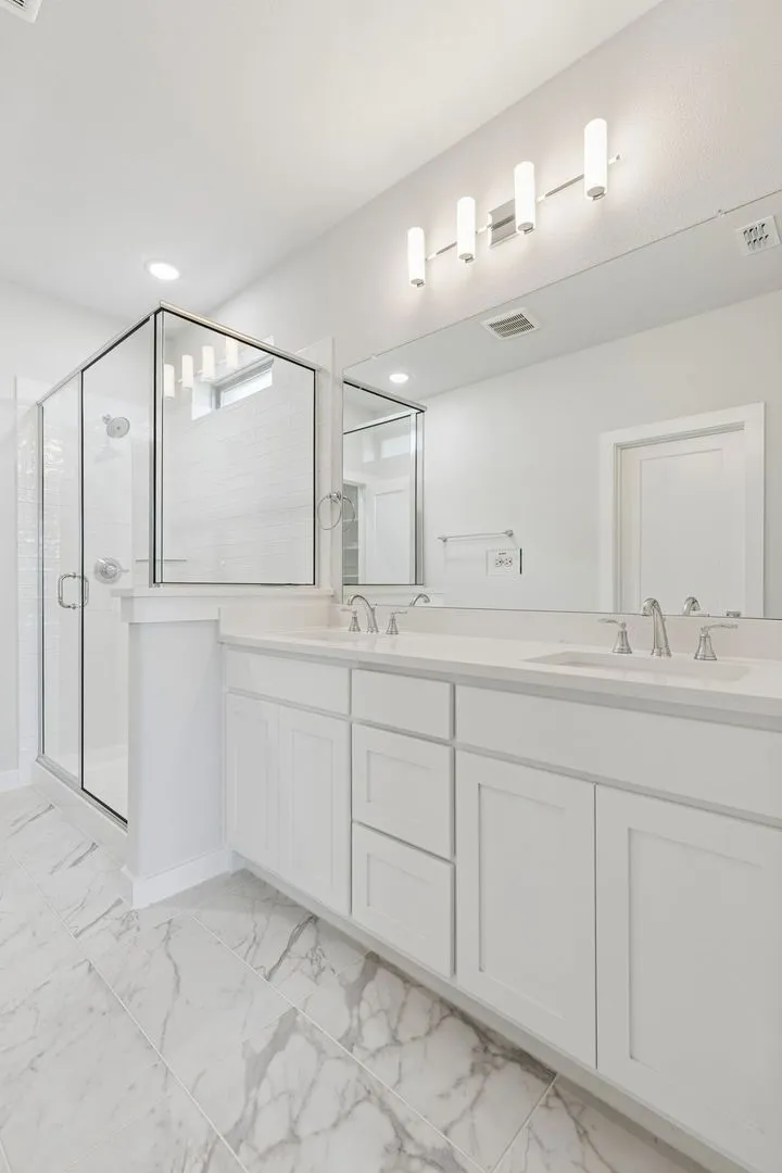 Primary Bathroom in the Stanley II home plan by Trophy Signature Homes – REPRESENTATIVE PHOTO