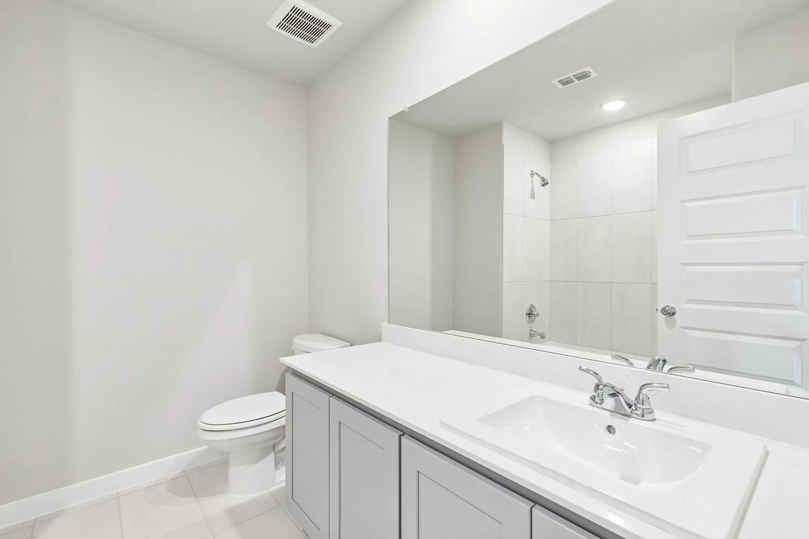 Bathroom in the Haylee home plan by Trophy Signature Homes - REPRESENTATIVE PHOTO