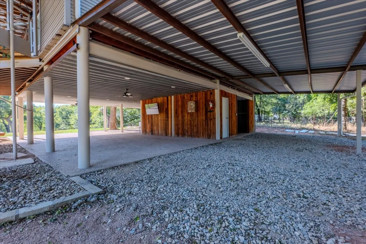 Covered parking and downstairs outdoor entertaining area