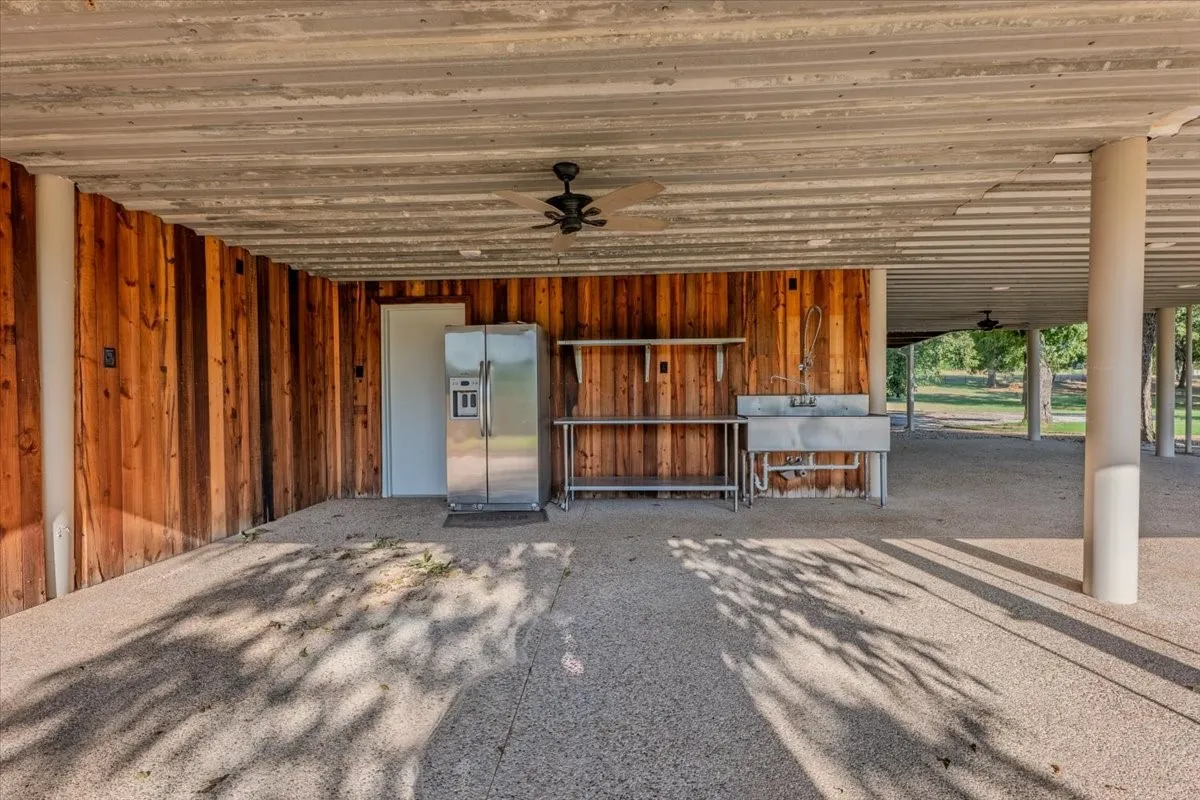 Additional view of outdoor kitchen and entertaining space
