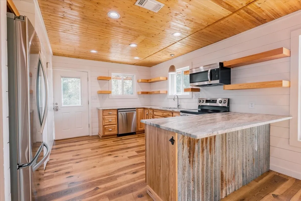 Newly remodeled kitchen with granite countertops
