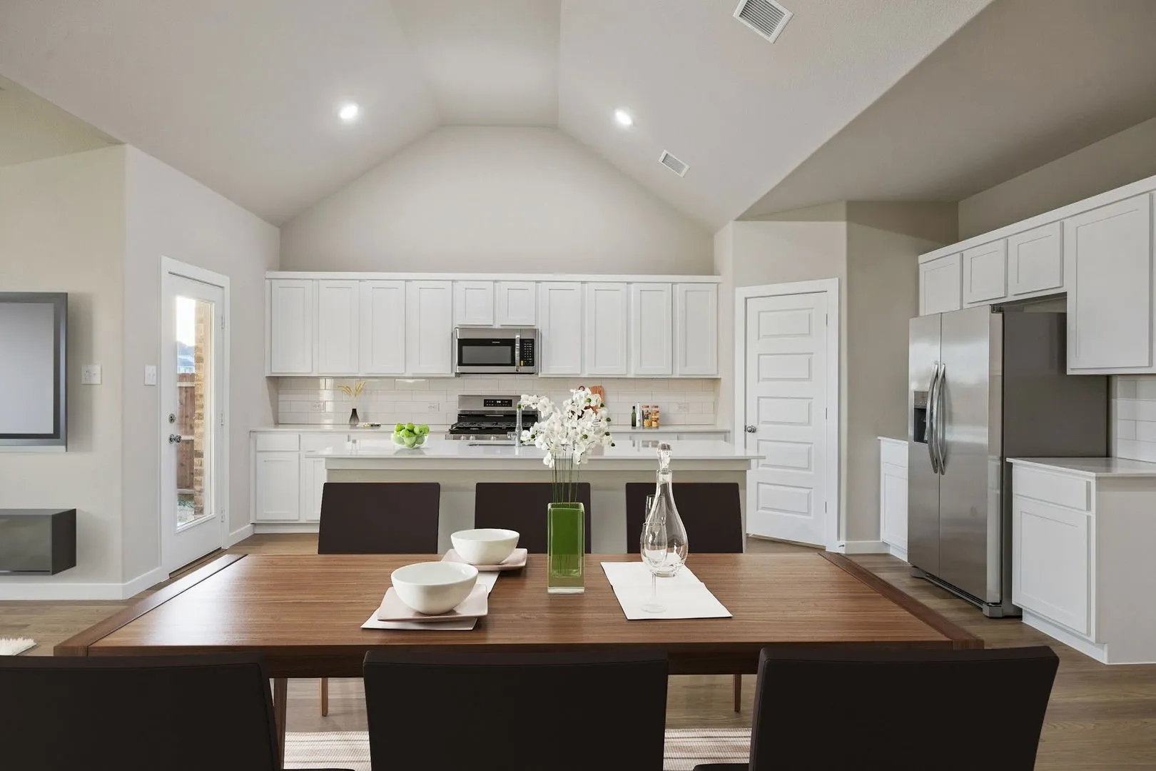 Kitchen in the Wimbledon home plan by Trophy Signature Homes – REPRESENTATIVE PHOTO