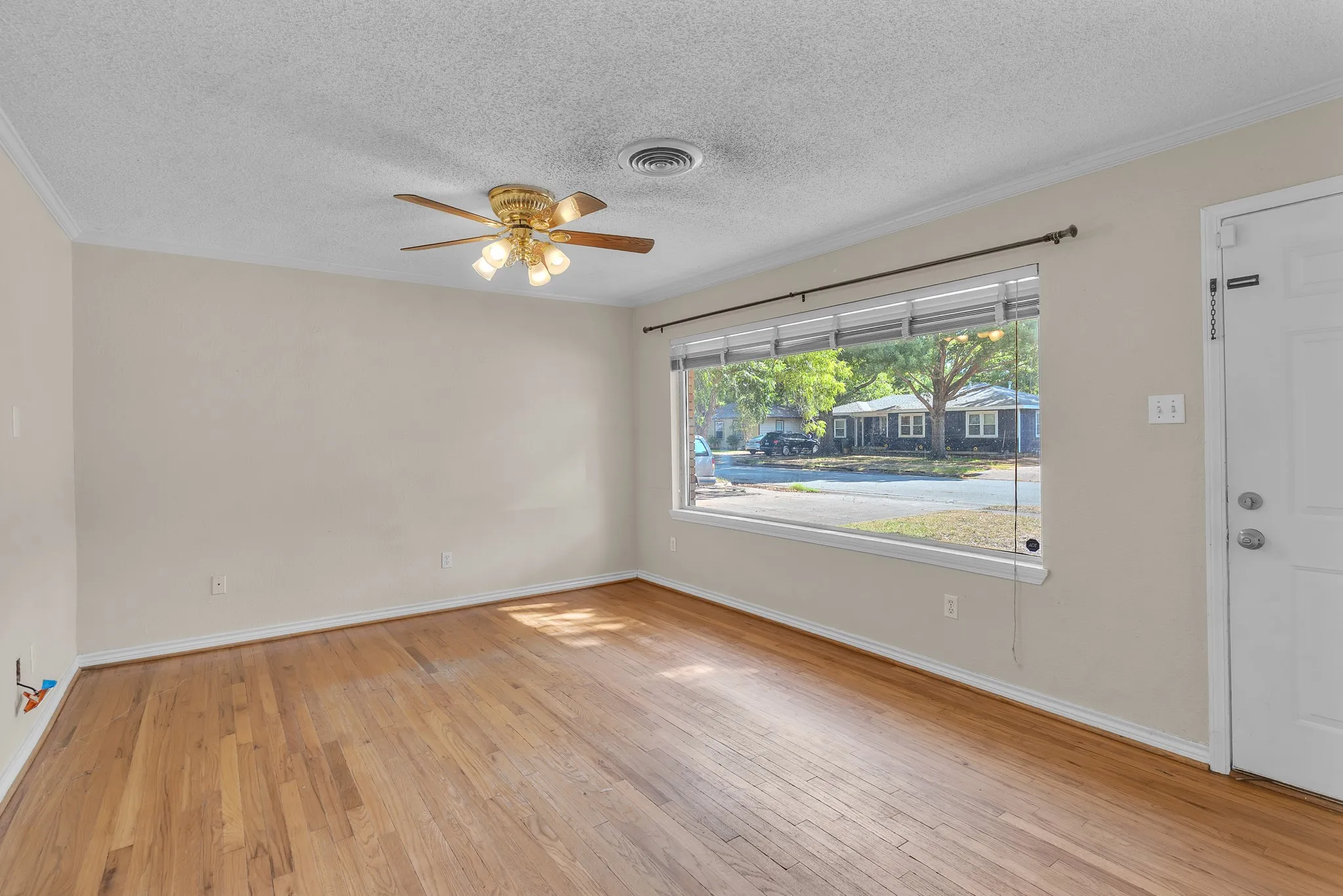 Main living area with original hardwood floors
