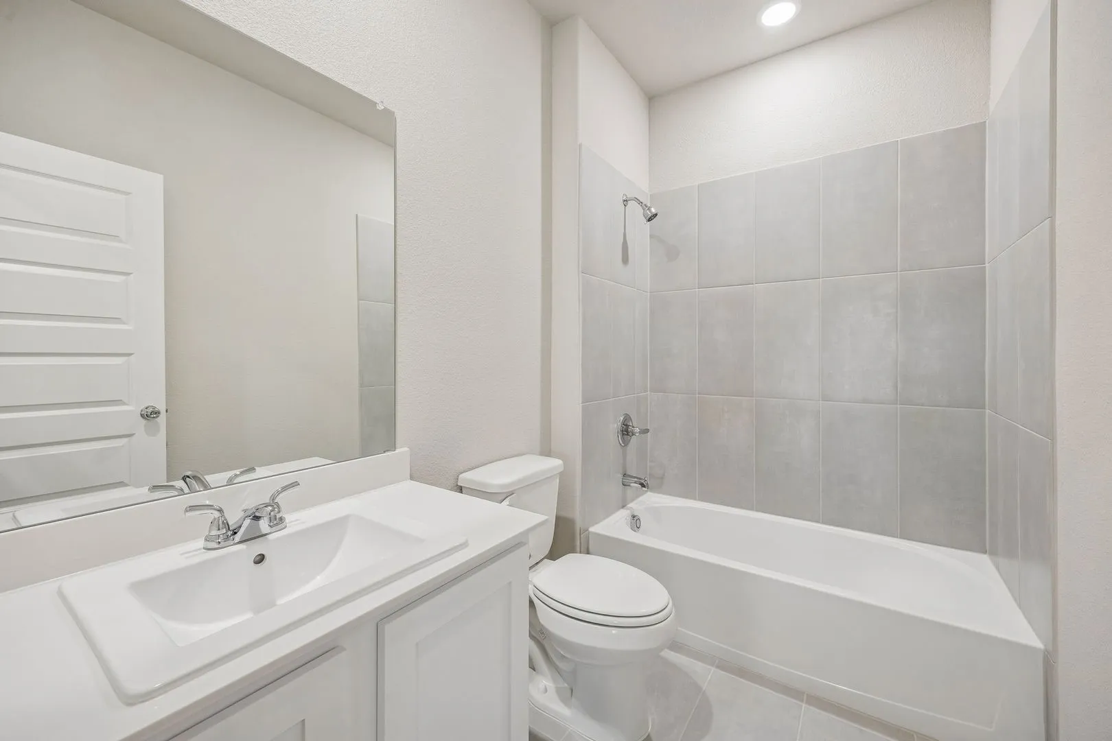 Bathroom in the Wimbledon home plan by Trophy Signature Homes – REPRESENTATIVE PHOTO