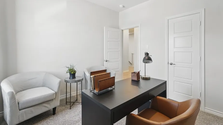 Neutral wall paint, carpet flooring, recessed lighting, solid panel doors, and modern door hardware