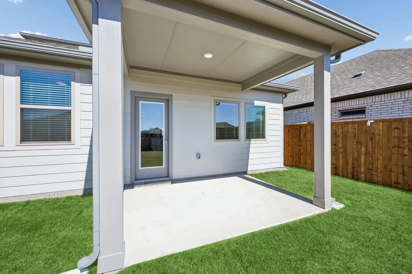 Covered Patio in the Mesquite home plan by Trophy Signature Homes – REPRESENTATIVE PHOTO