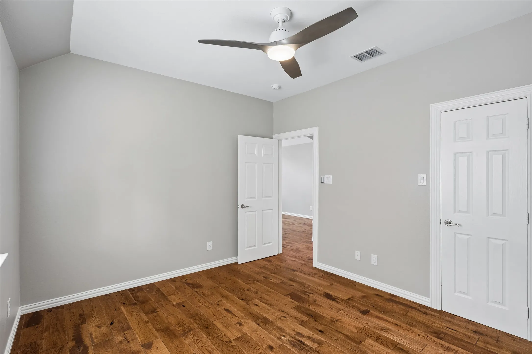 3rd bedroom downstairs with walk in closet