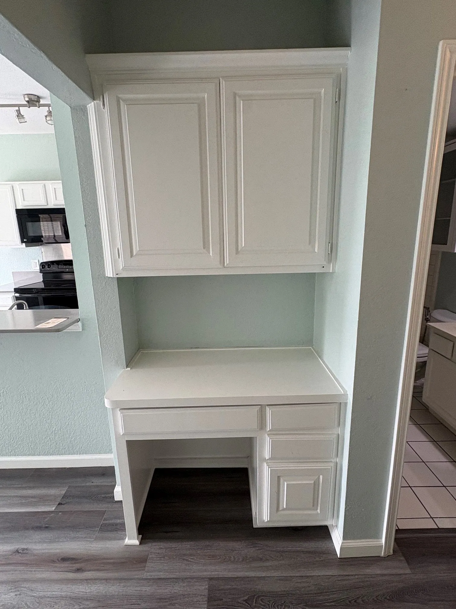 Built-in cabinet with desk area.