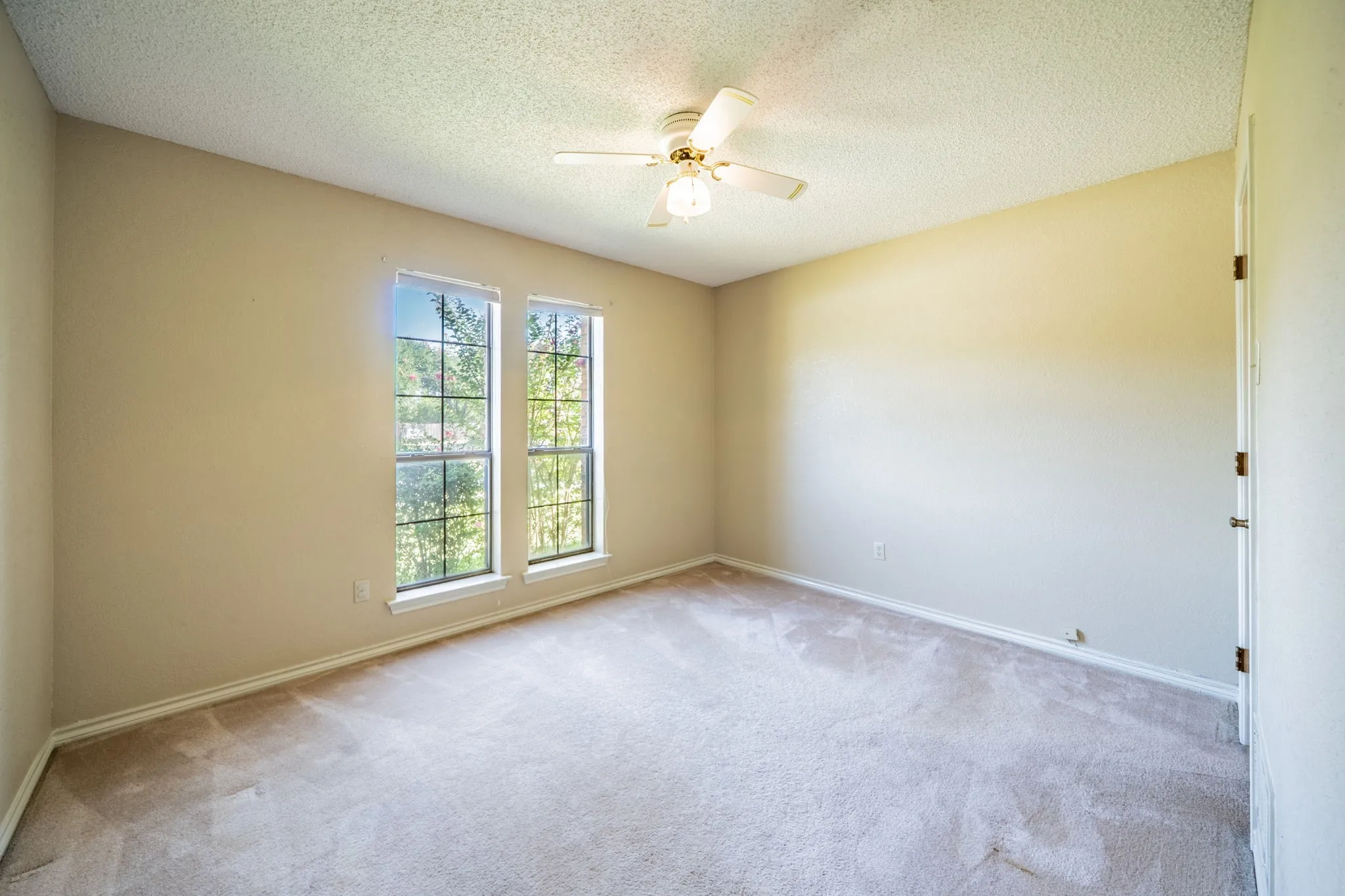 This is the third bedroom.  Both secondary bedrooms are on the front of the house.  Primary bedroom is at the back of the house.