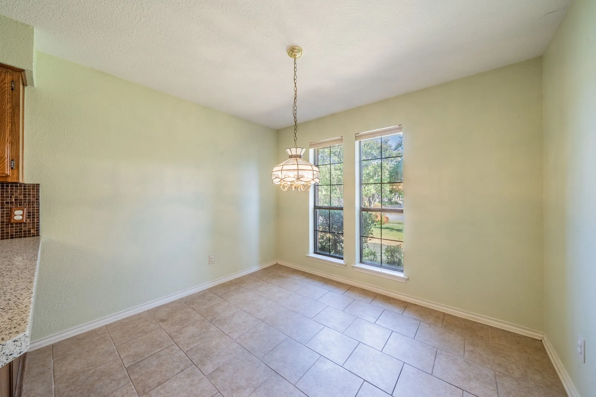 Breakfast area at end of kitchen.