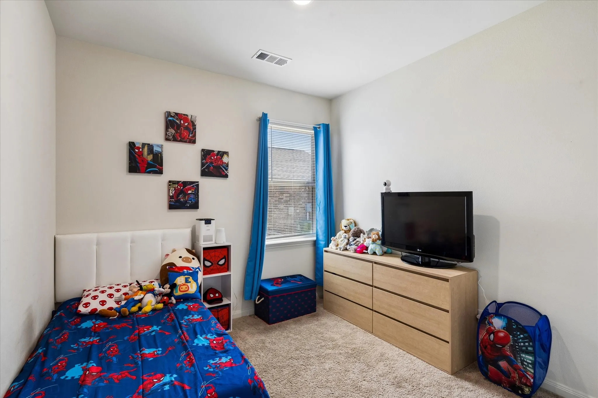 Carpeted flooring, window with natural light, recessed lighting, and light-toned walls