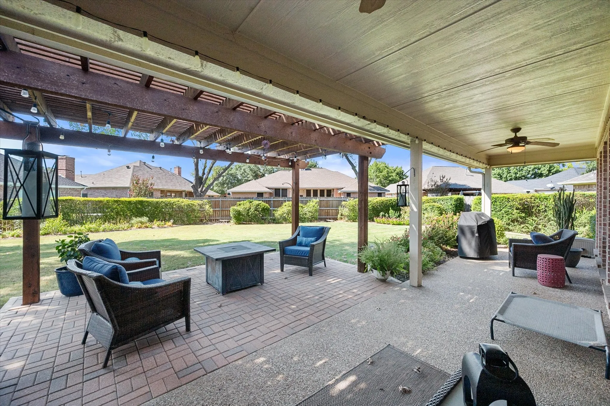Enjoy a BBQ on the large covered patio with view of the nicely landscaped yard