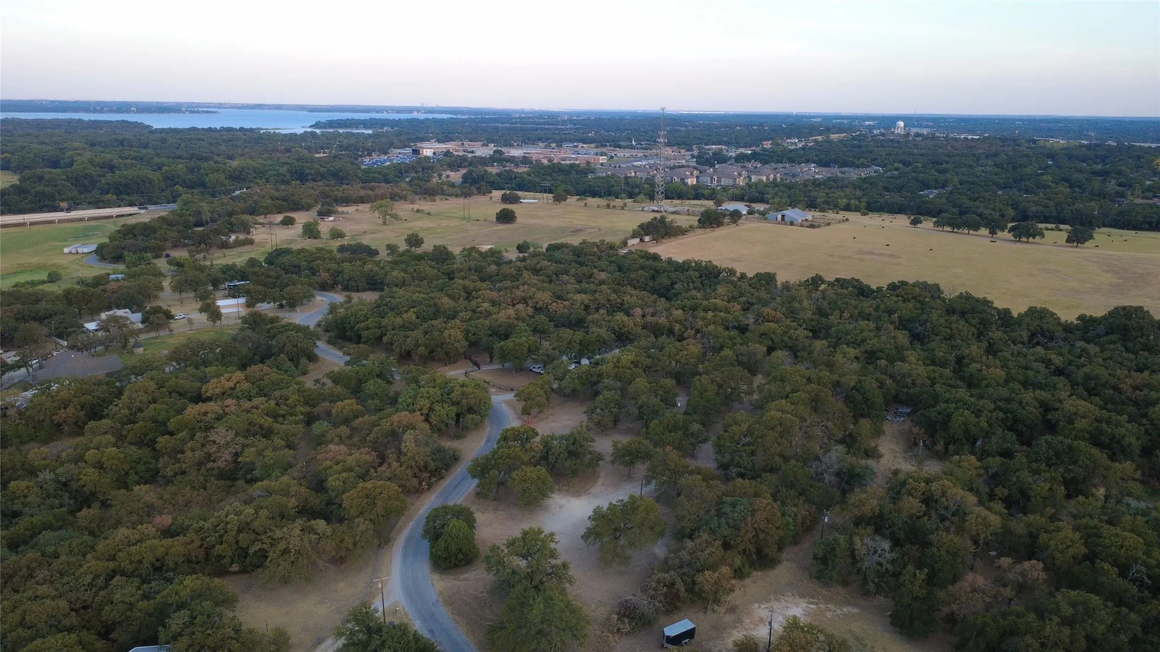 View of Eagle Mountain Lake, Azle High School, Azle Water Tower (Wal-Mart), town, etc.
